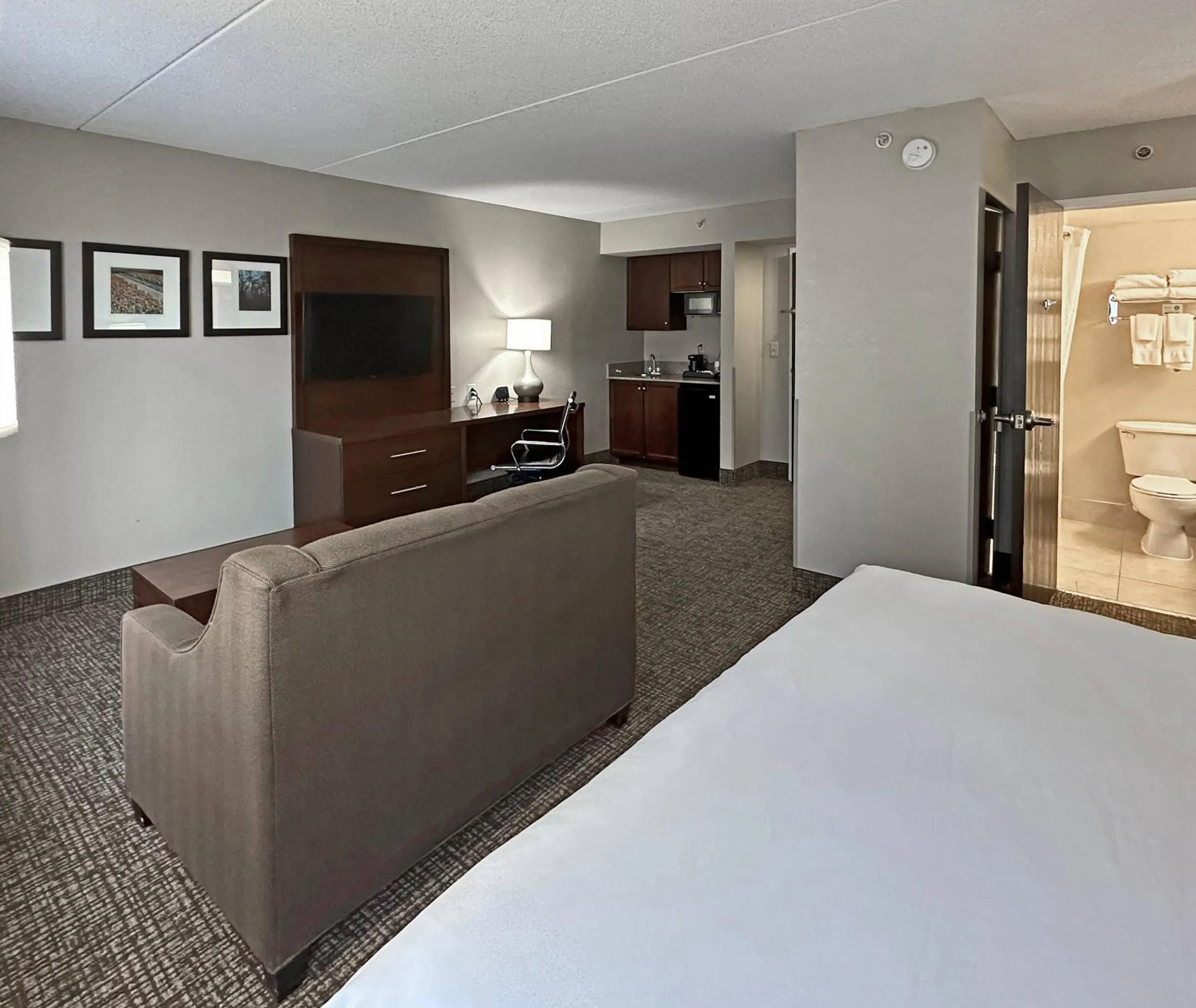 Bedroom, Bed in Concord Suites by IHG