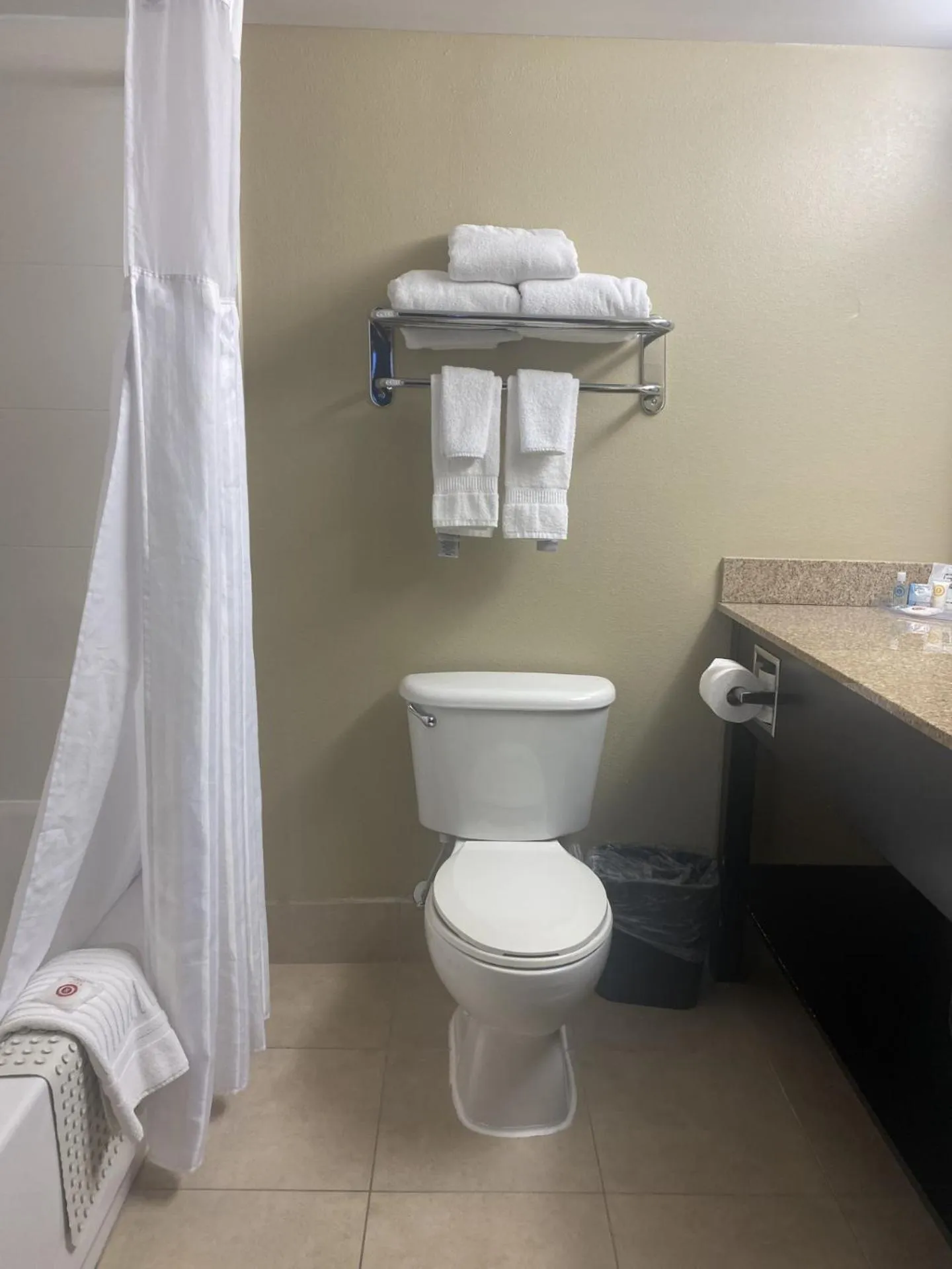 Bathroom in Concord Suites by IHG