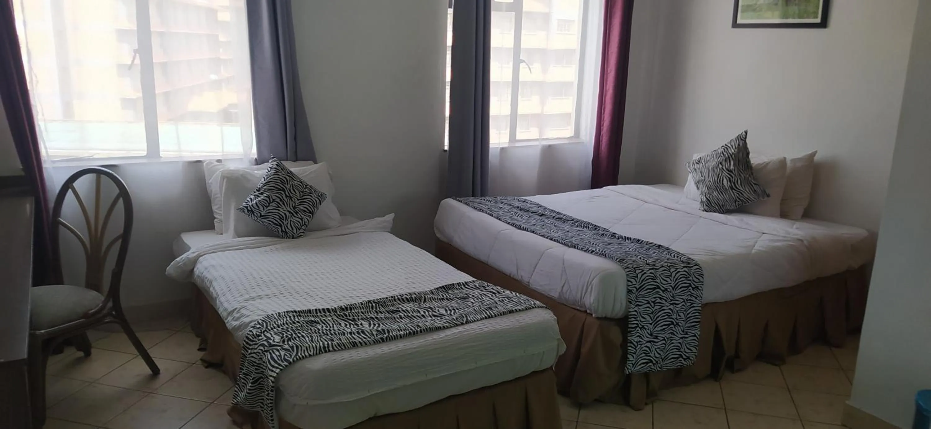 Bed in Plus254 Hotel