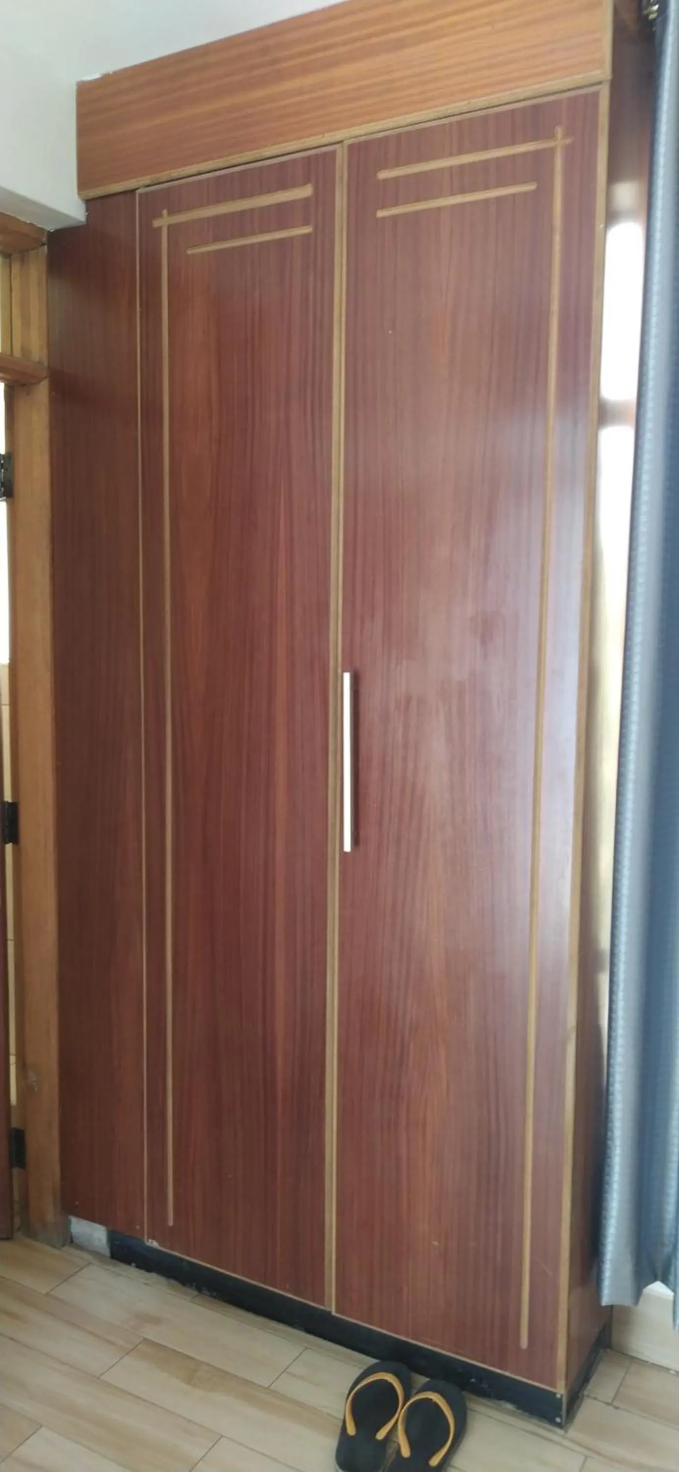 wardrobe in Plus254 Hotel