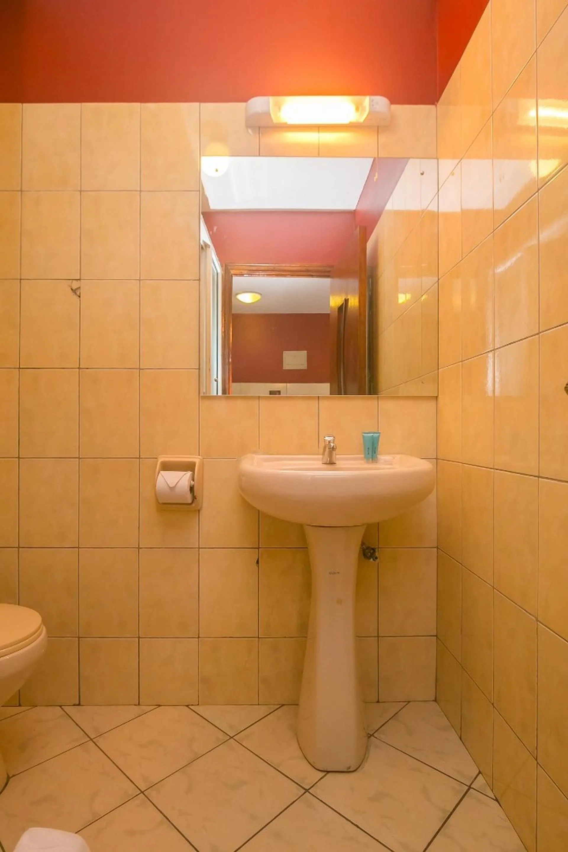 Bathroom in Plus254 Hotel