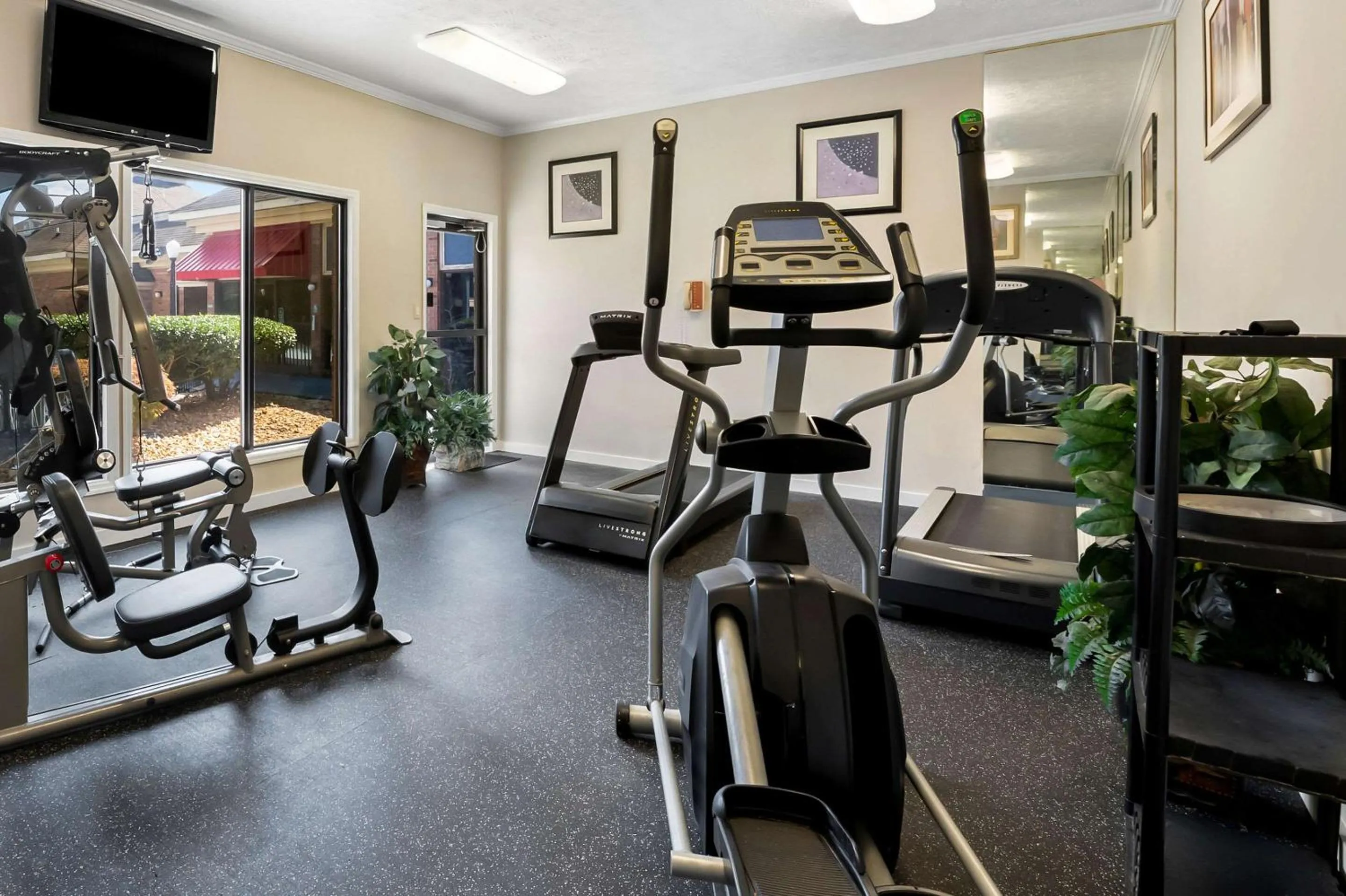 Fitness centre/facilities in SureStay Plus Hotel by Best Western Fayetteville