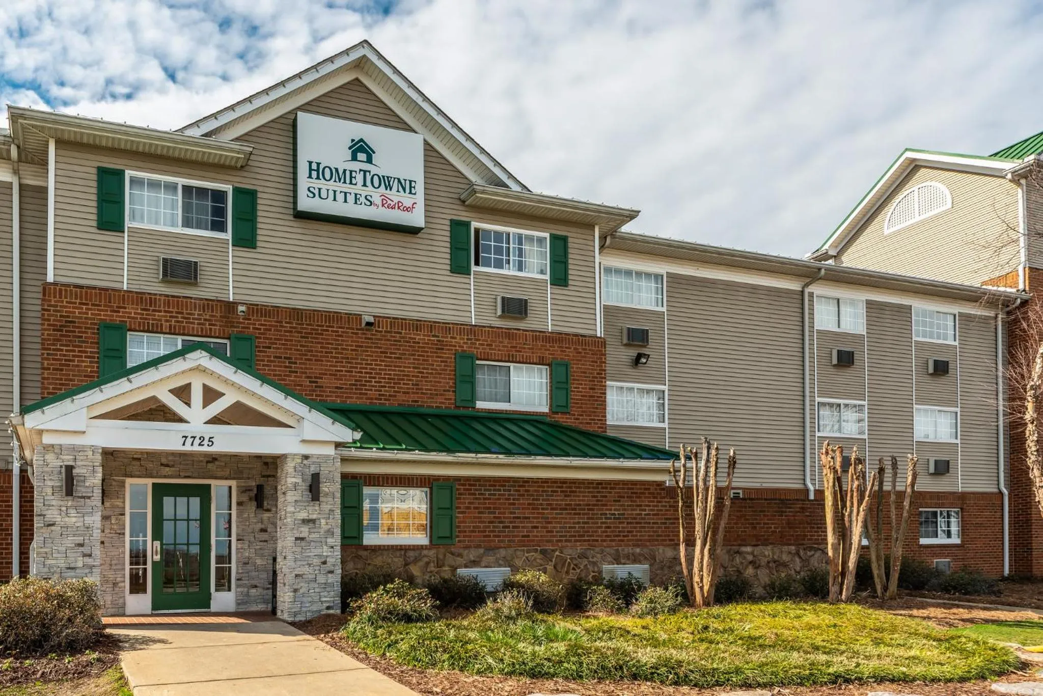 Property building in HomeTowne Studios & Suites by Red Roof Charlotte - Concord