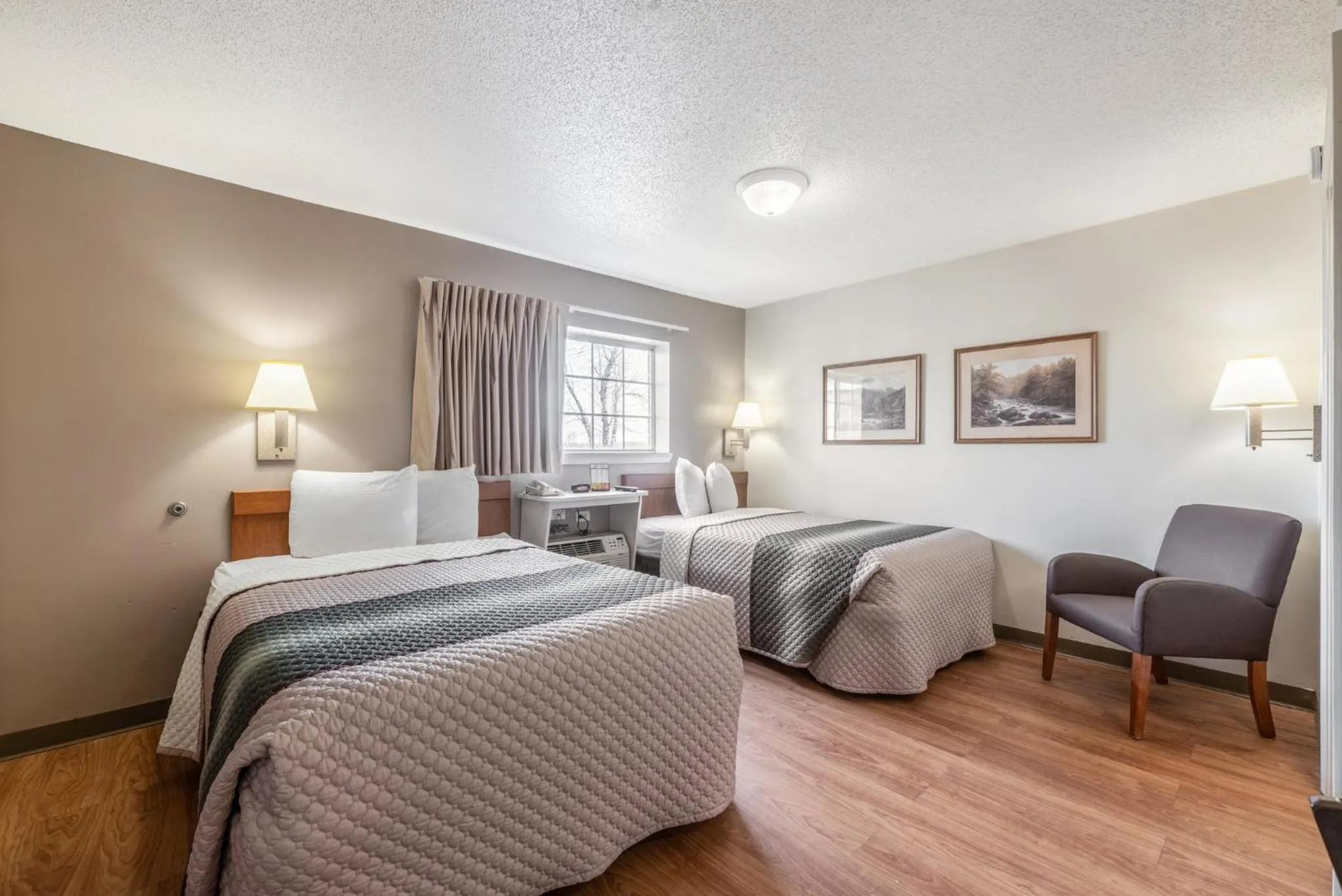 Photo of the whole room, Bed in HomeTowne Studios & Suites by Red Roof Charlotte - Concord