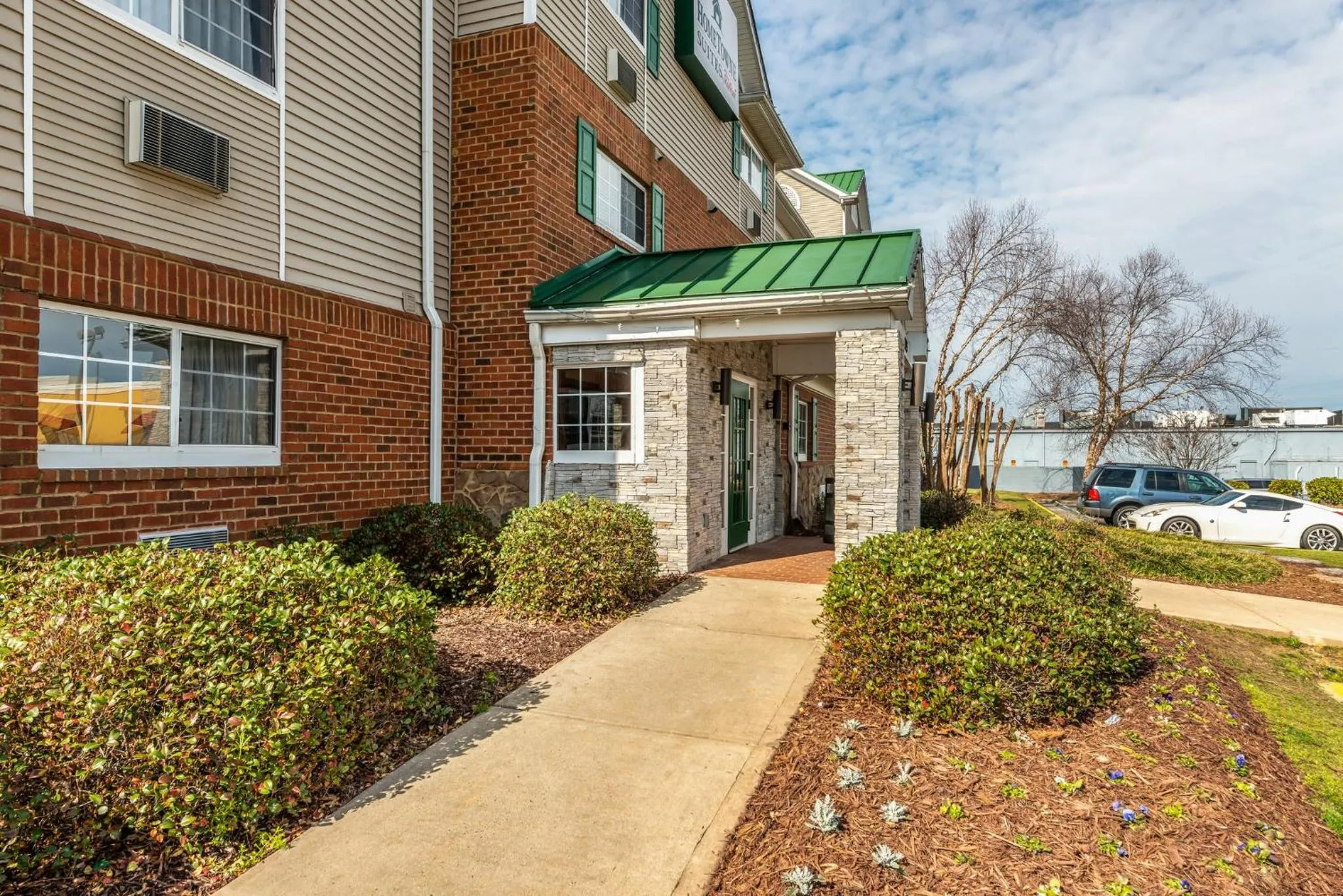 Property building in HomeTowne Studios & Suites by Red Roof Charlotte - Concord