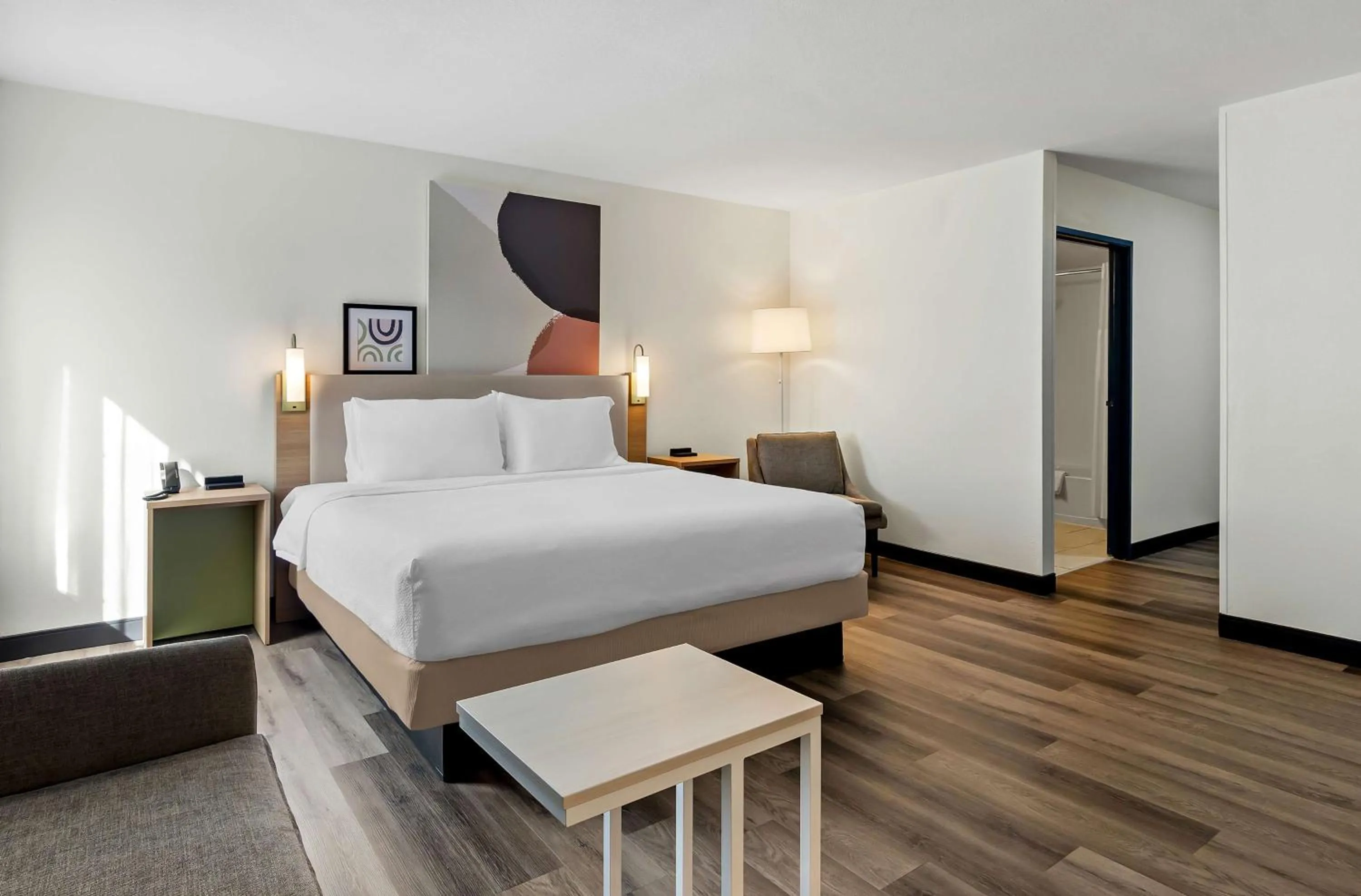 Living room, Bed in Spark by Hilton Winston-Salem University