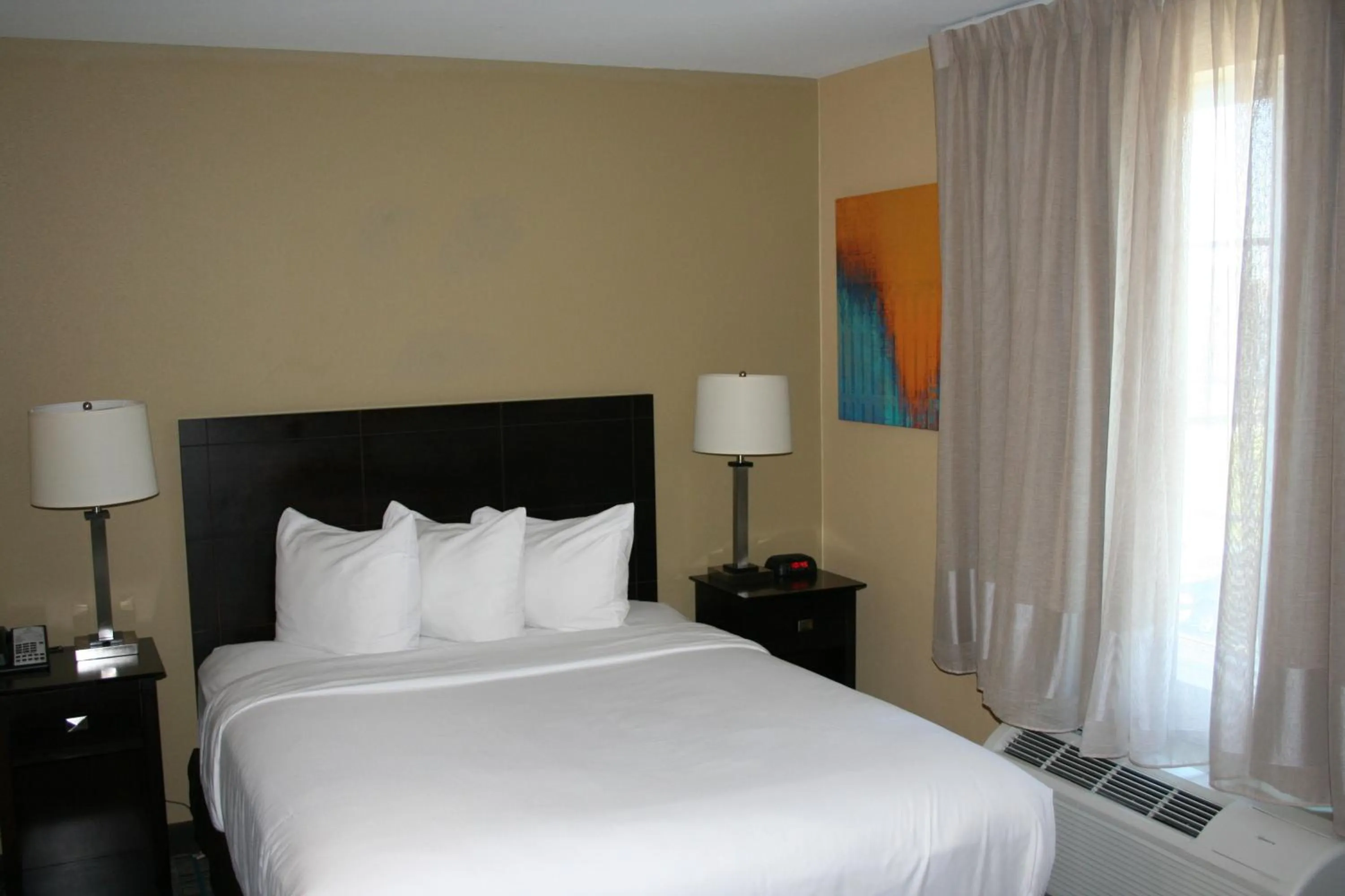 Bedroom, Bed in MainStay Suites Jacksonville near Camp Lejeune