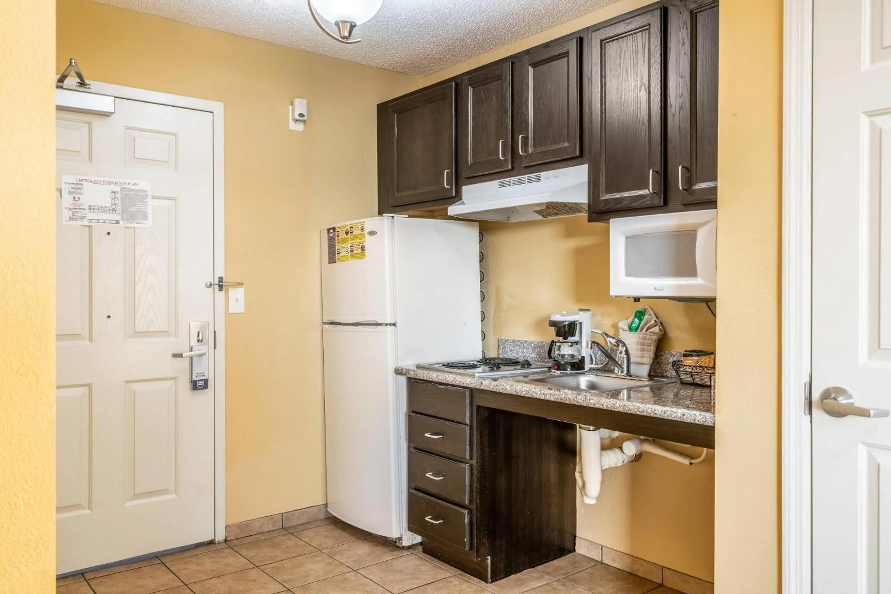 Bedroom in Suburban Studios Near Camp Lejeune