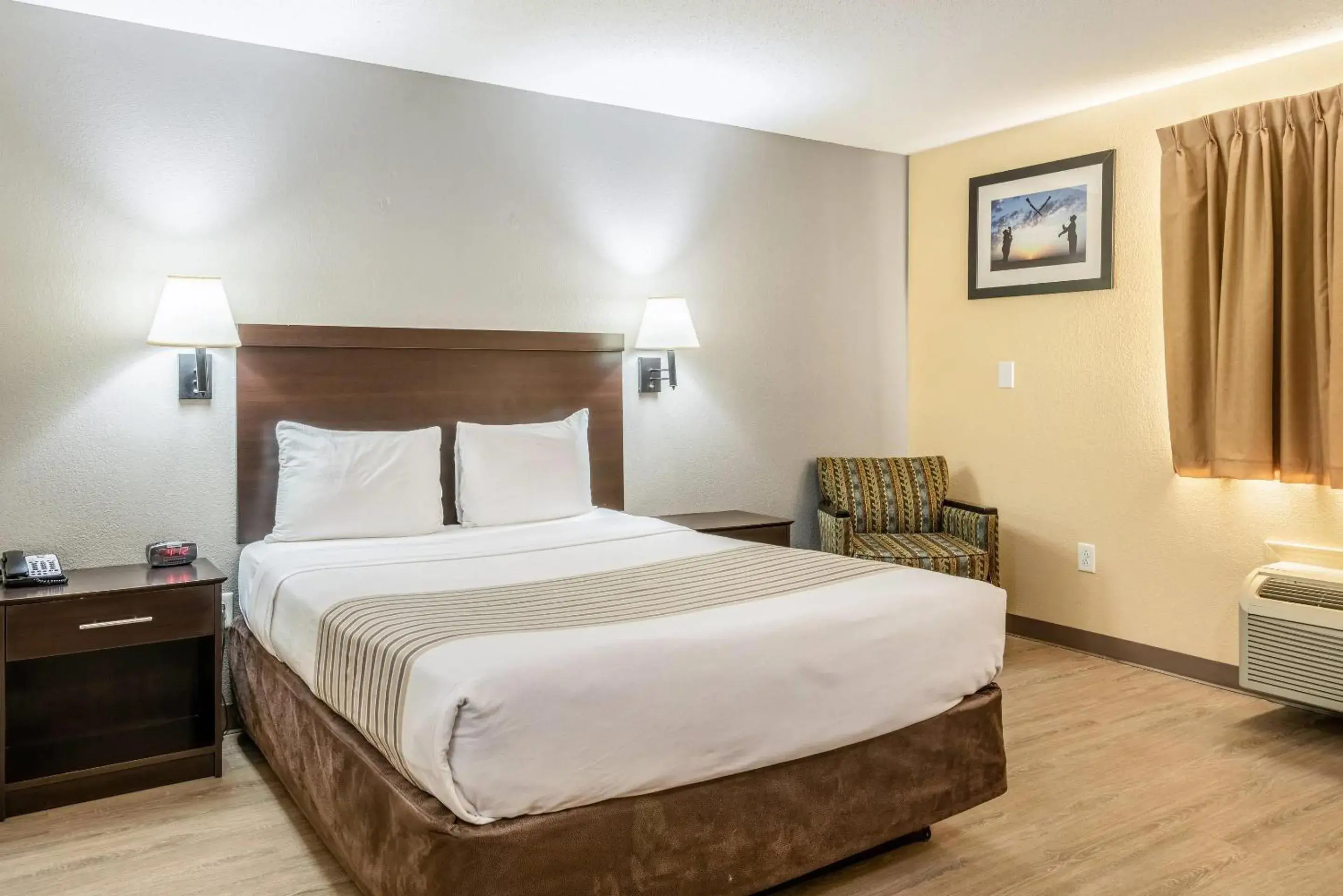 Queen Suite - Non-Smoking in Suburban Studios Near Camp Lejeune Queen Suite - Non-Smoking in Suburban Studios Near Camp Lejeune