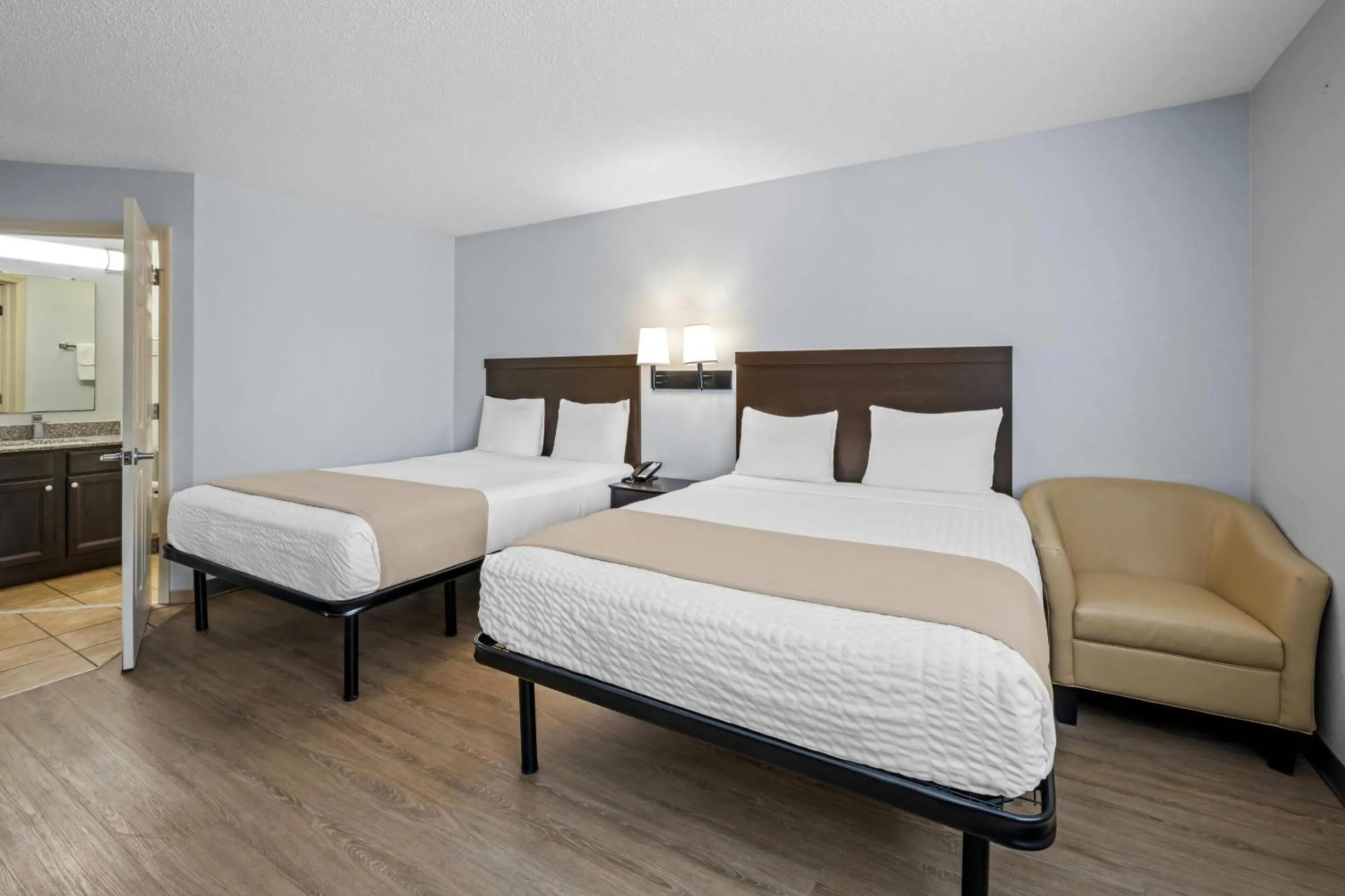 Bedroom, Bed in Suburban Studios Near Camp Lejeune