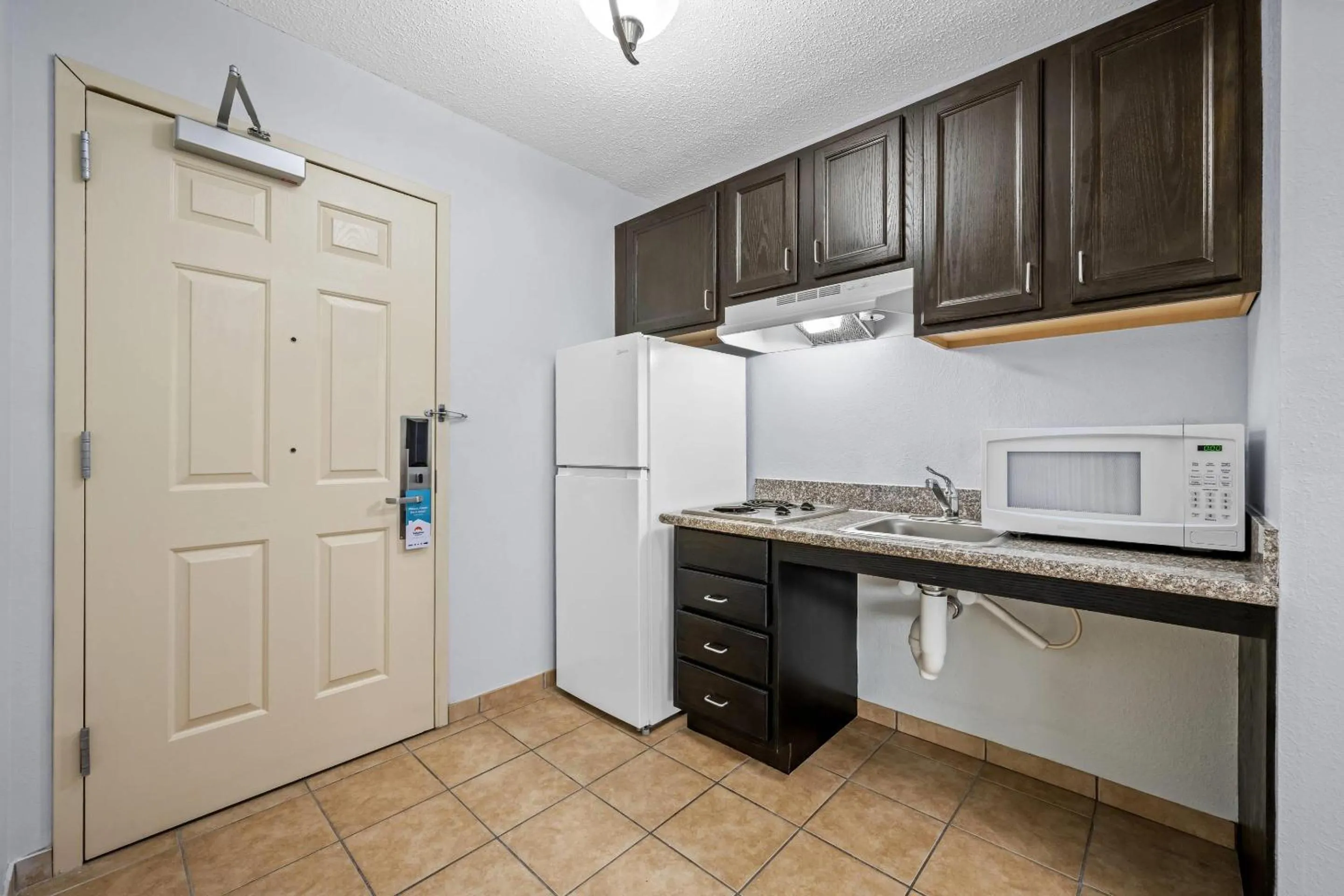 Bedroom in Suburban Studios Near Camp Lejeune