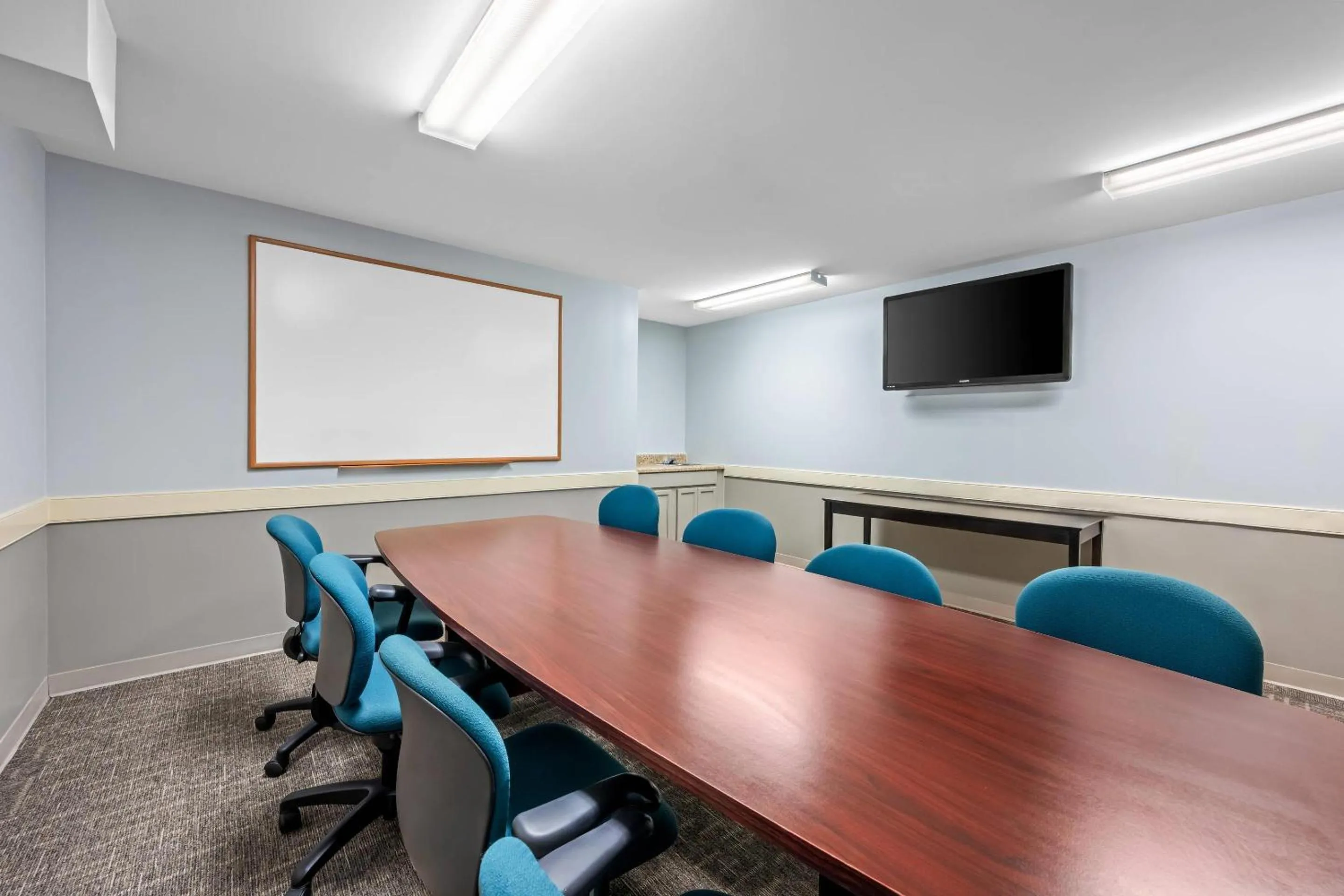 Meeting/conference room in Suburban Studios Near Camp Lejeune