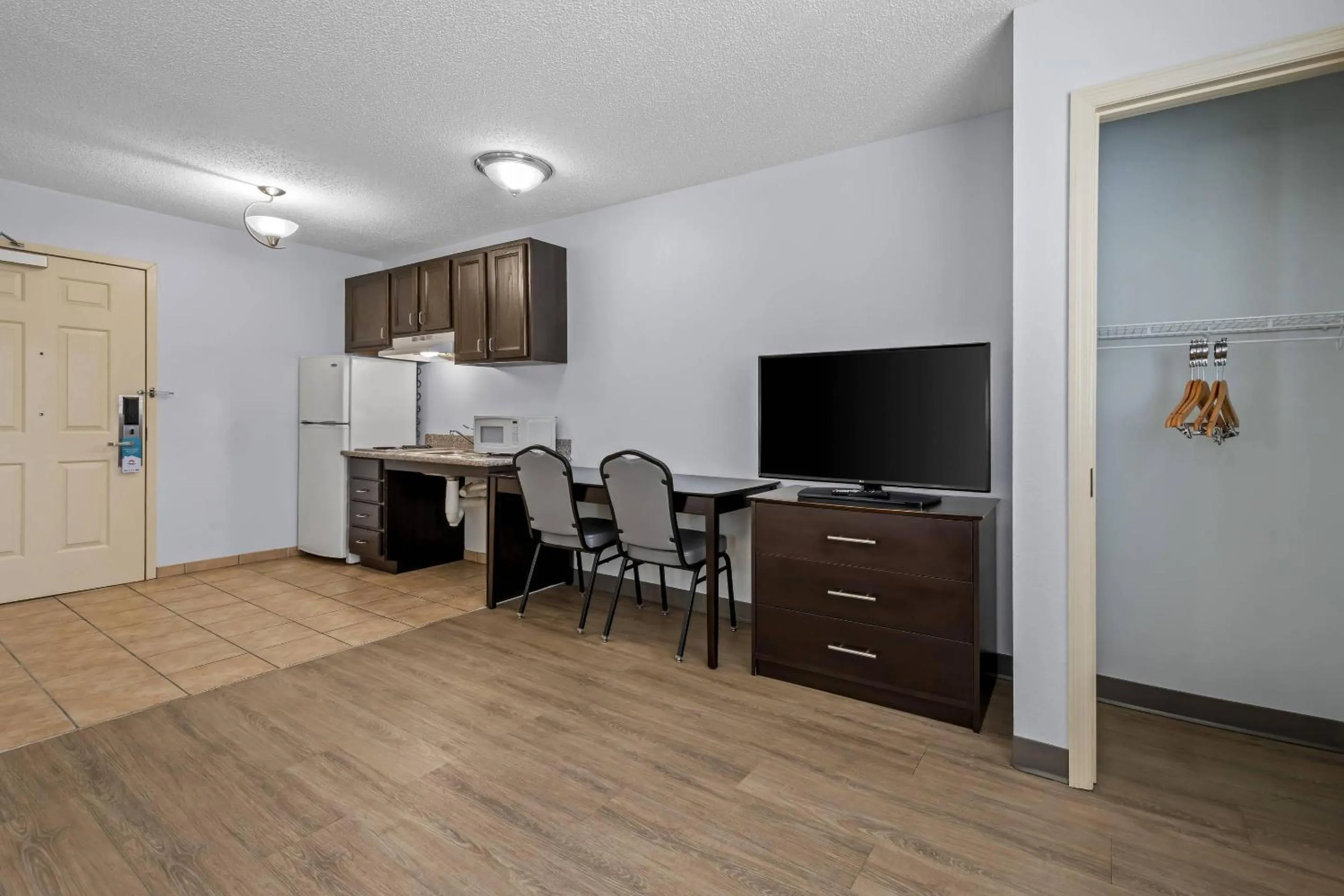 Bedroom in Suburban Studios Near Camp Lejeune