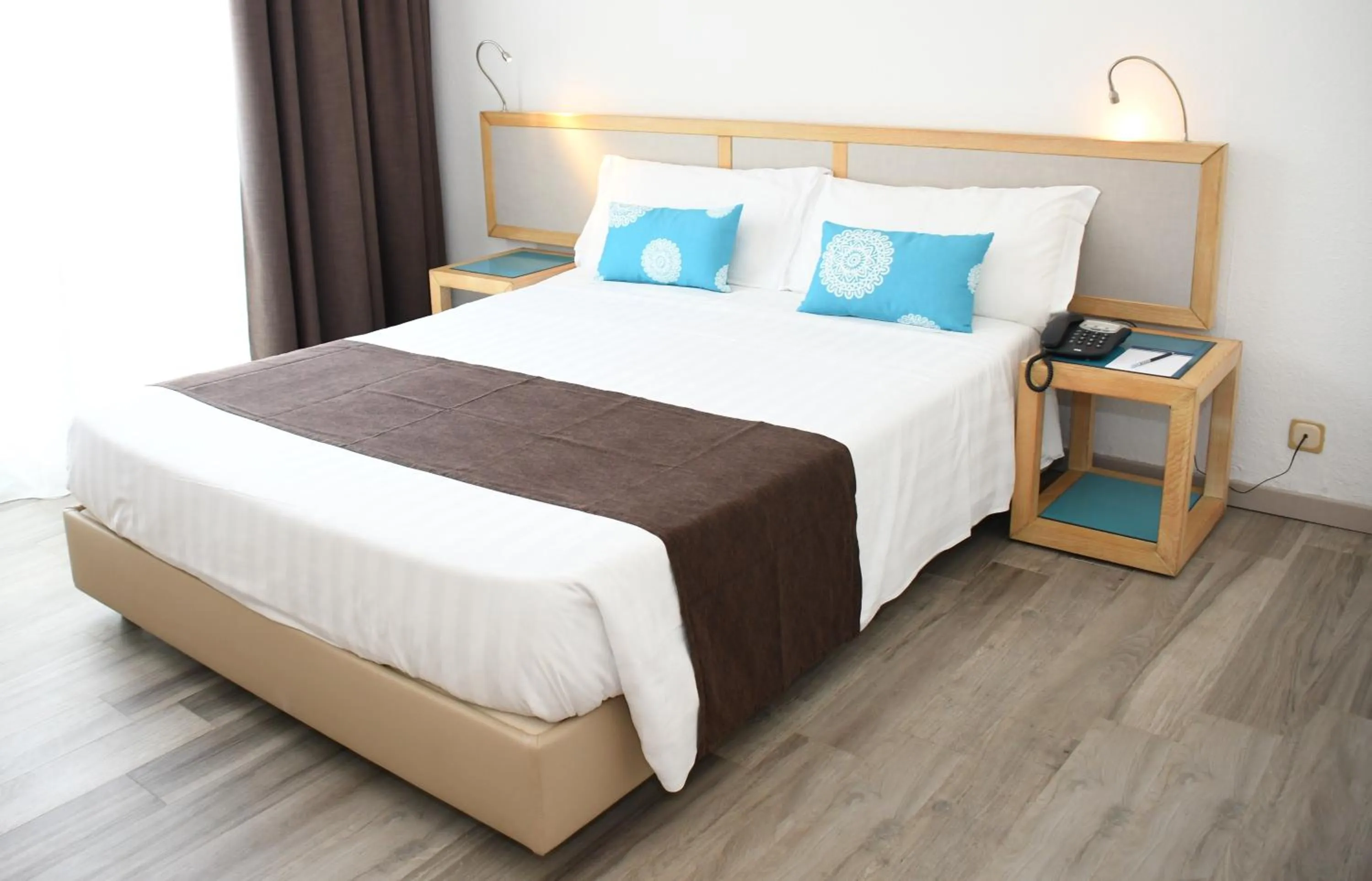 Bed in Baia di Conte Resort