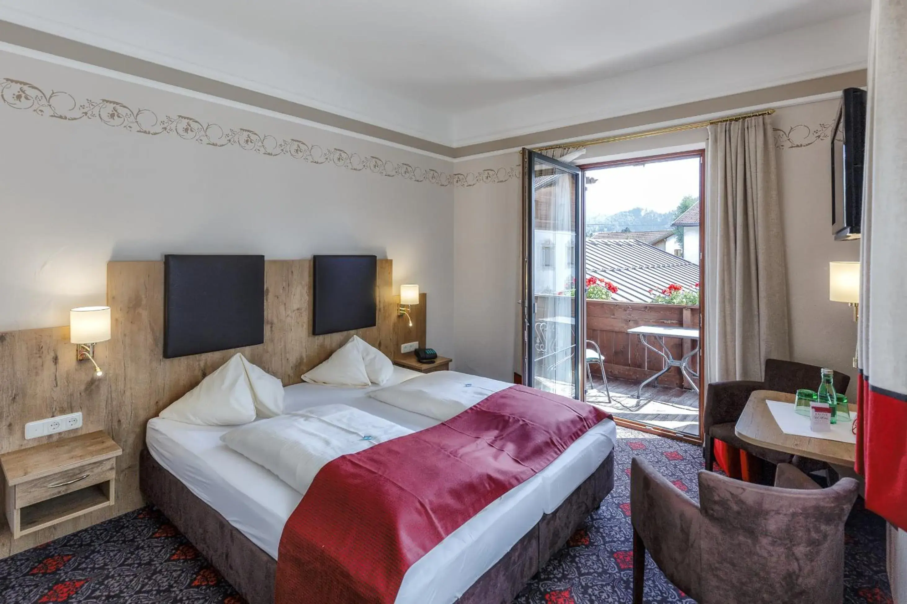 Deluxe Double Room with Balcony in Hotel Krone Tirol Deluxe Double Room with Balcony in Hotel Krone Tirol