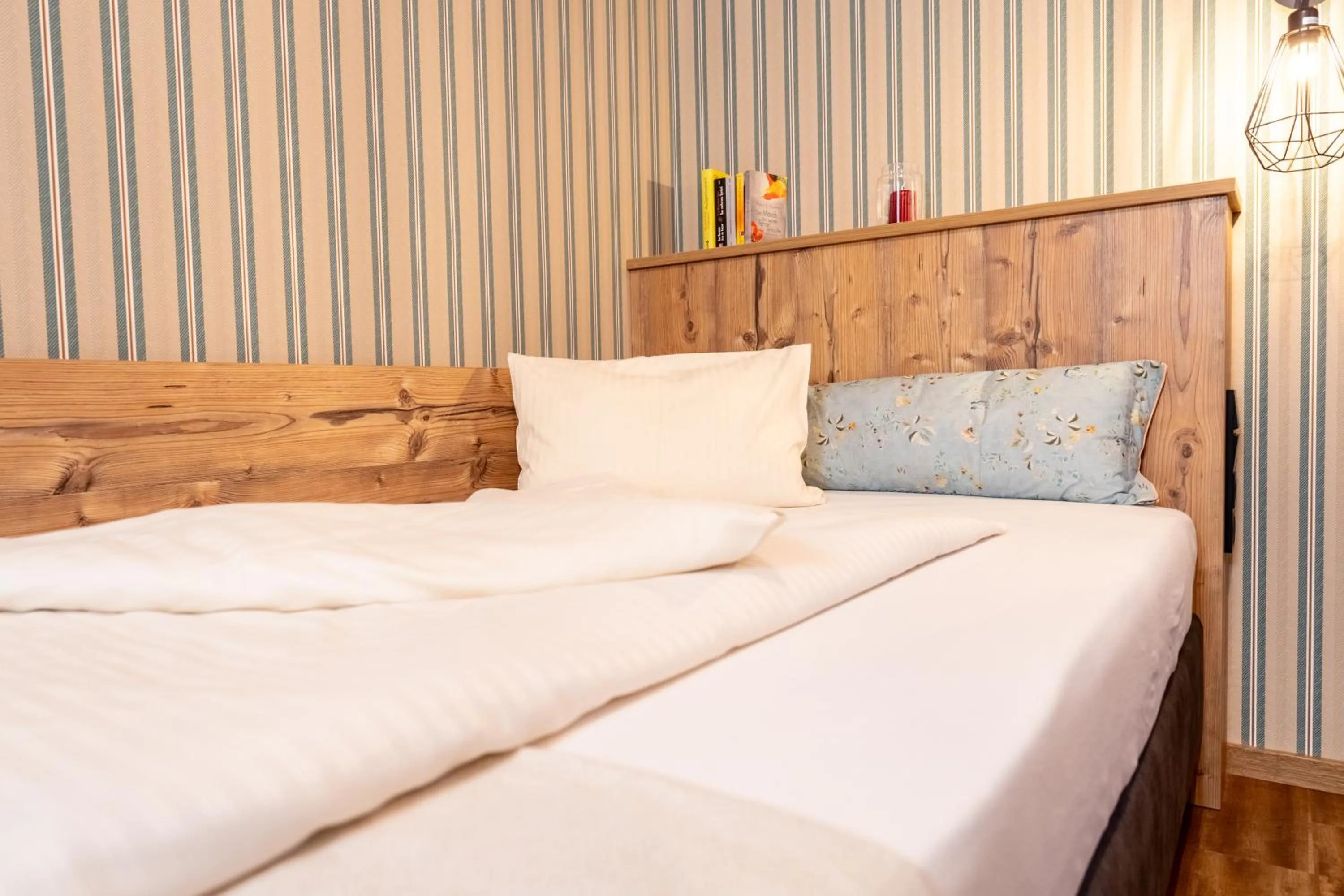 Bed in Hotel Krone Tirol