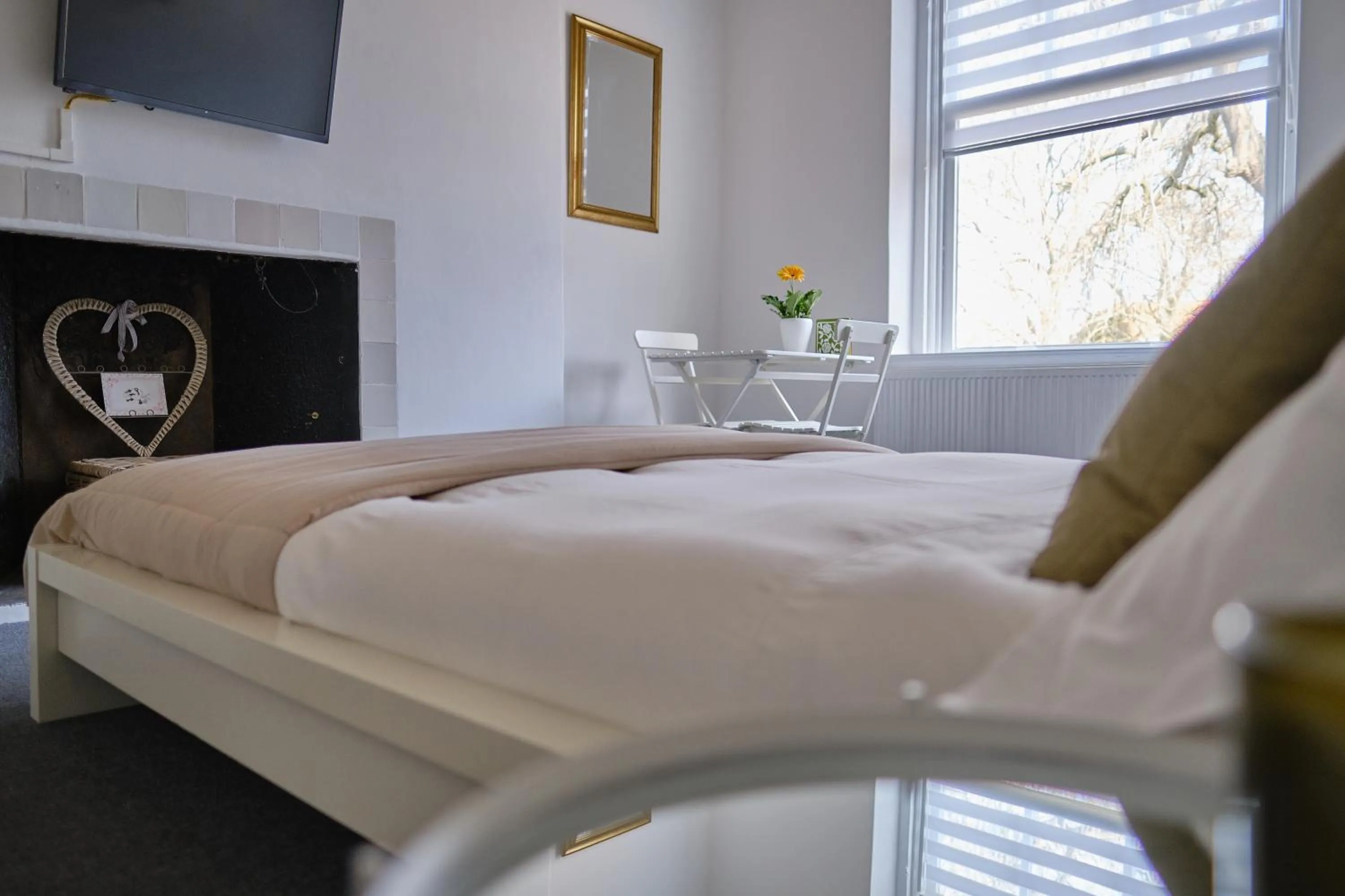 Bed in Het Gecroonde Swaert B&B