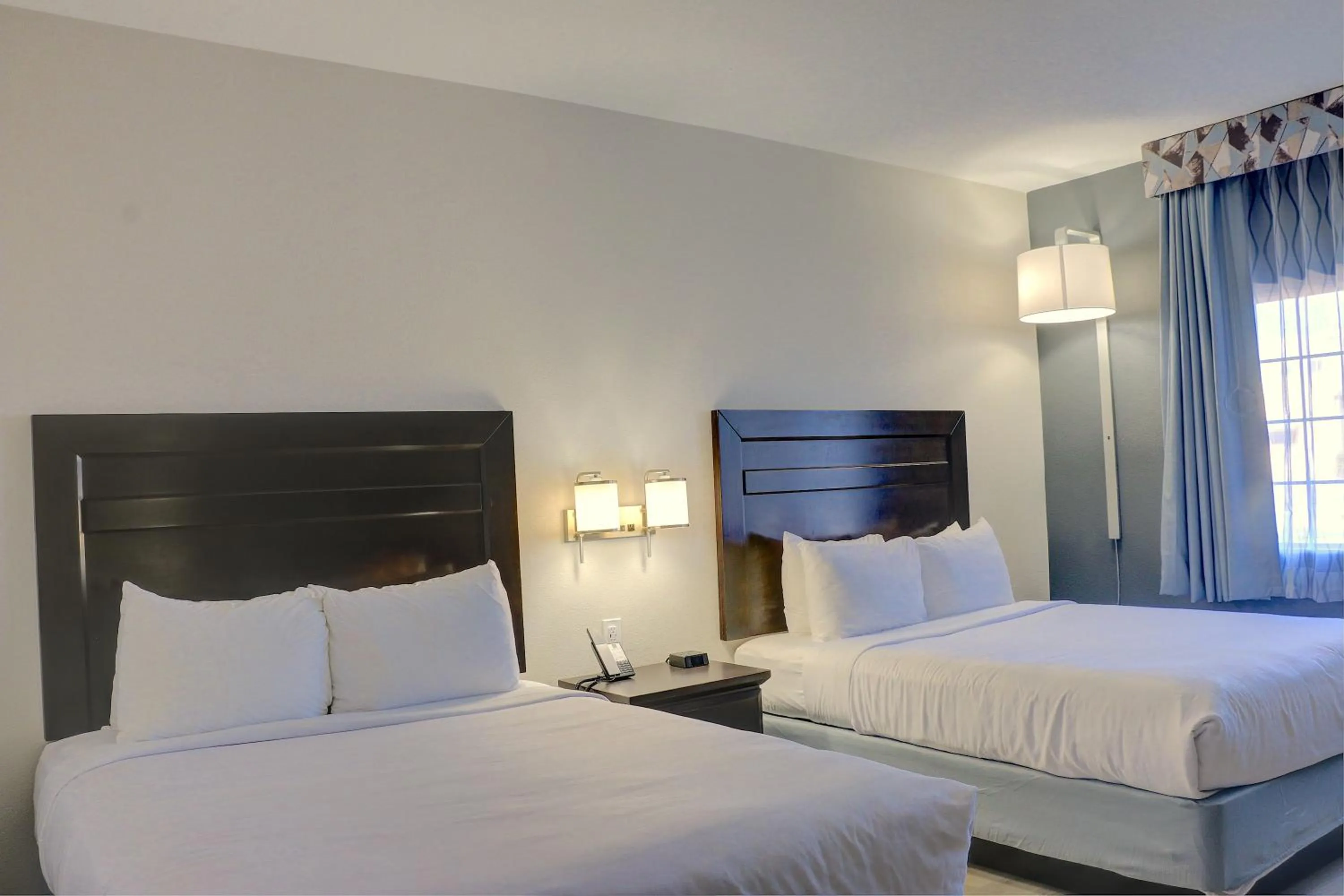 Bed in Quality Inn & Suites Roswell North