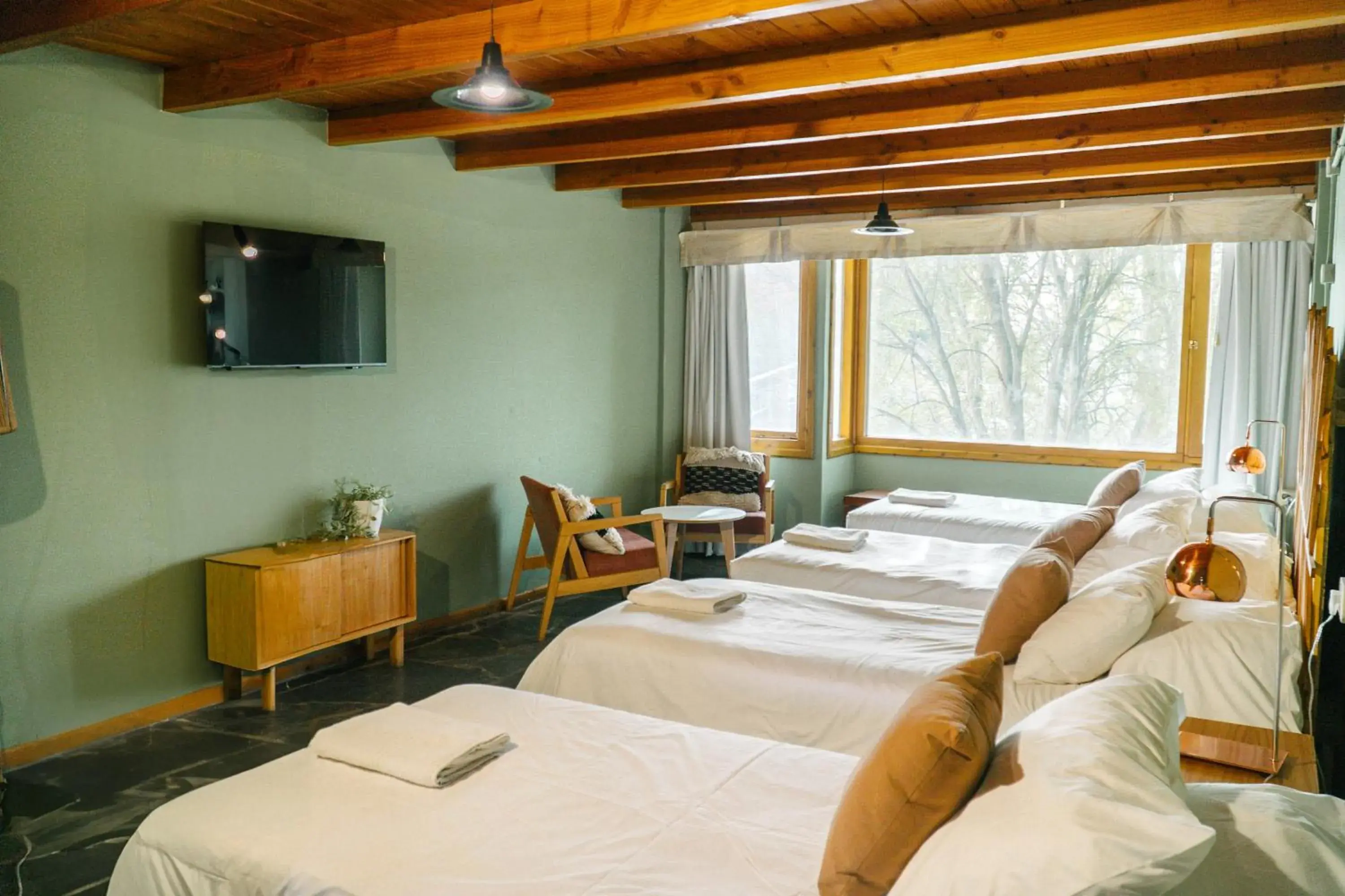 Quadruple Room in Pioneros Suites by Grupo Tierra Gaucha Quadruple Room in Pioneros Suites by Grupo Tierra Gaucha