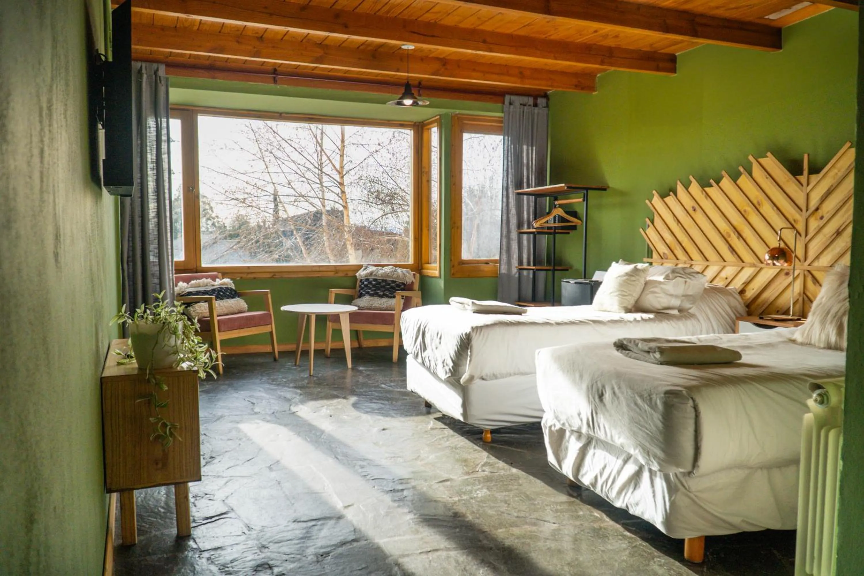 Bedroom, Bed in Pioneros Suites by Grupo Tierra Gaucha