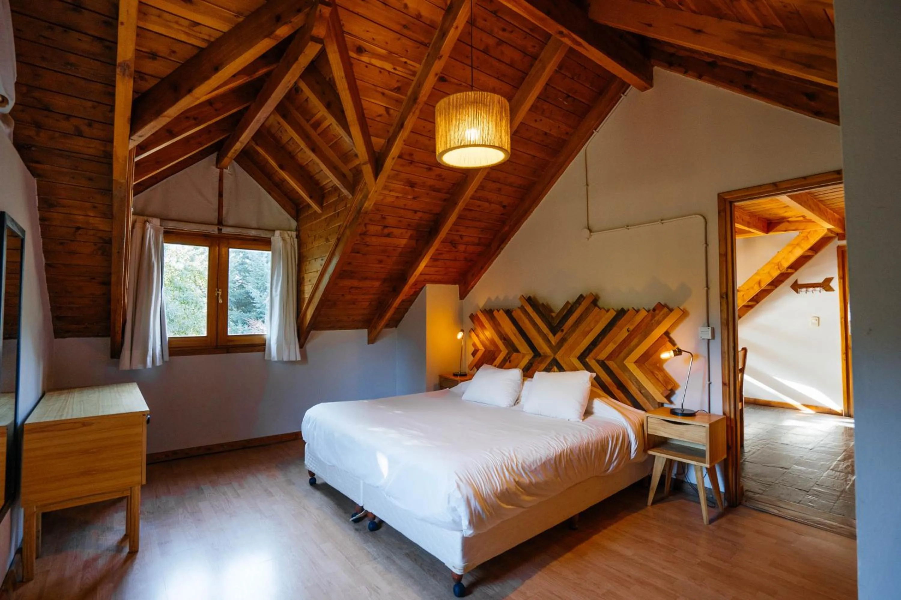 Photo of the whole room, Bed in Pioneros Suites by Grupo Tierra Gaucha