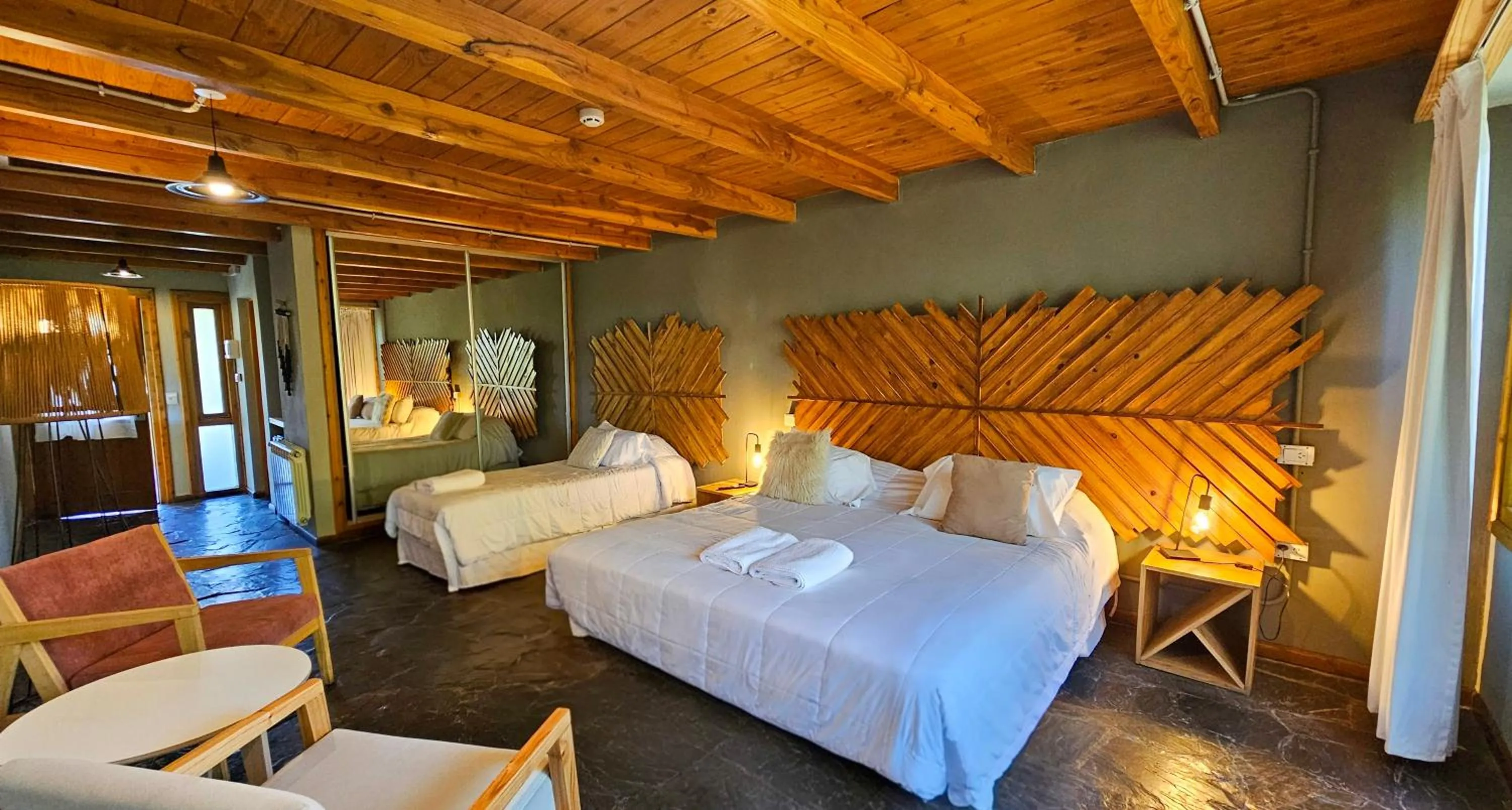 Bedroom, Bed in Pioneros Suites by Grupo Tierra Gaucha