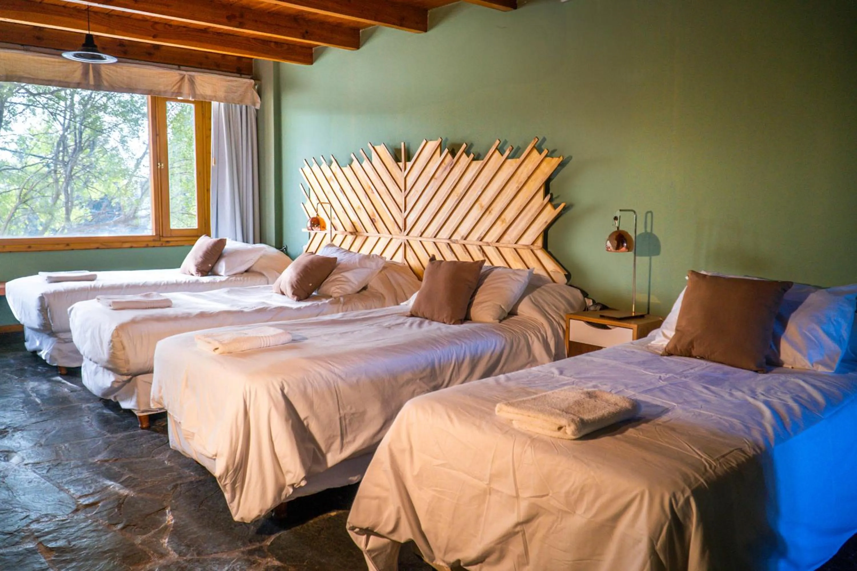 Photo of the whole room, Bed in Pioneros Suites by Grupo Tierra Gaucha