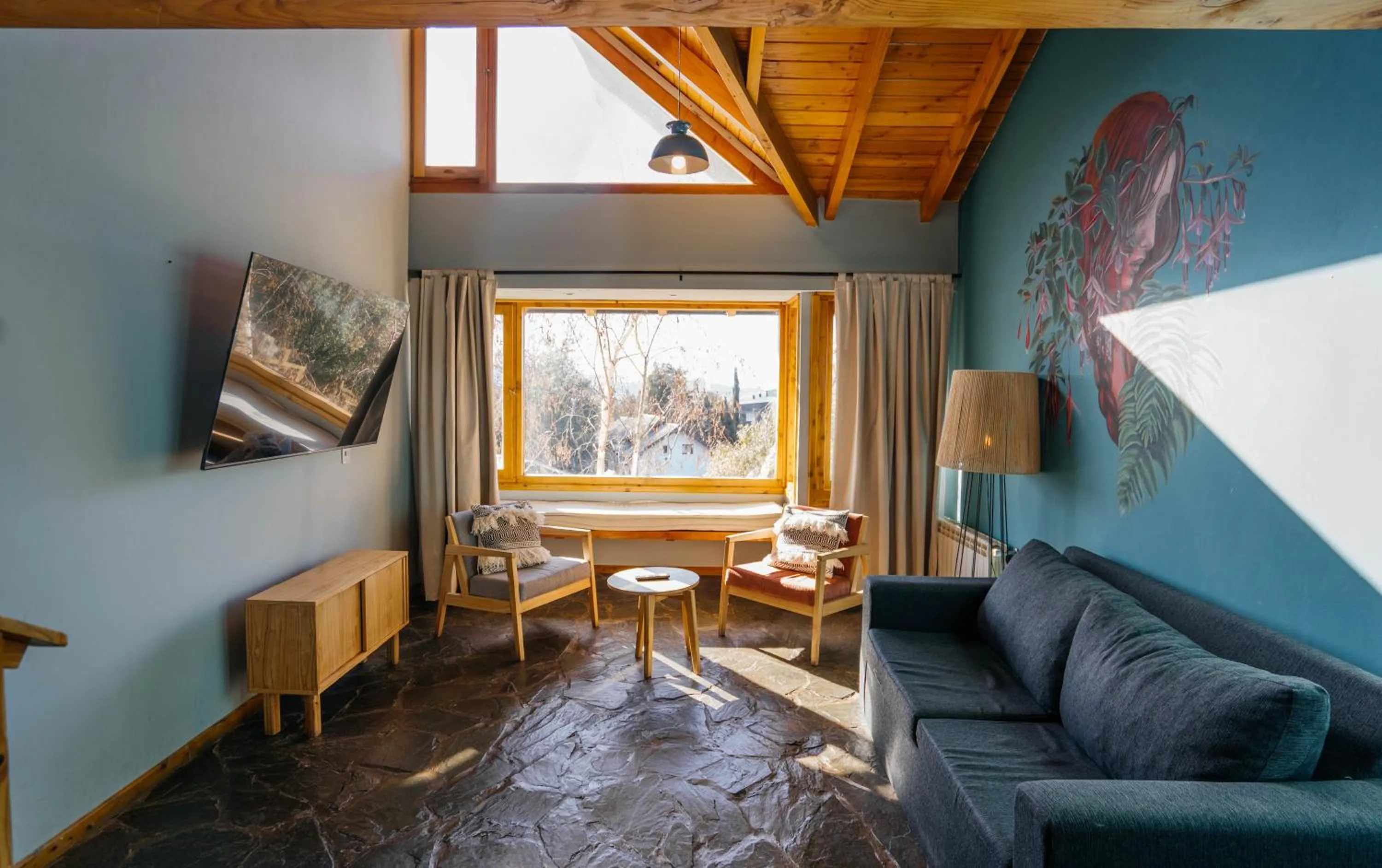 Living room in Pioneros Suites by Grupo Tierra Gaucha