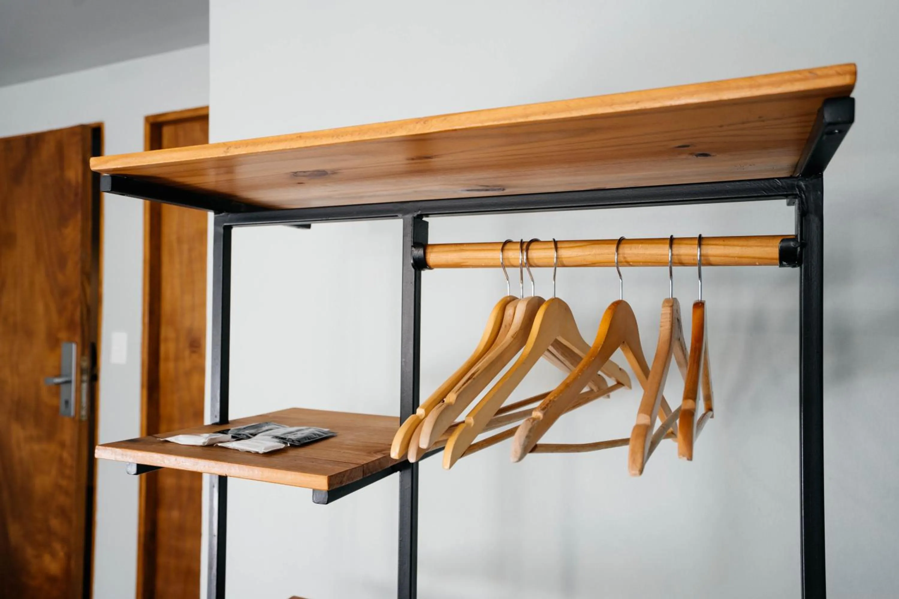 wardrobe in Pioneros Suites by Grupo Tierra Gaucha
