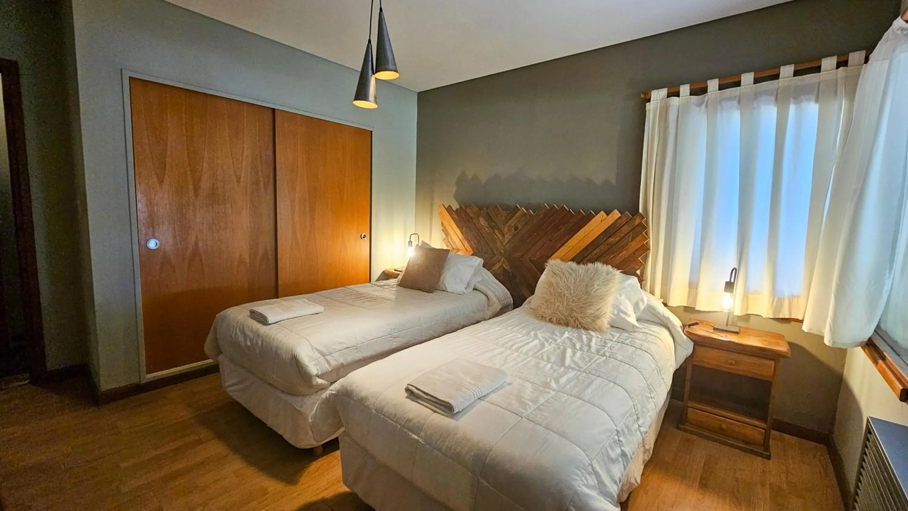 Bedroom, Bed in Pioneros Suites by Grupo Tierra Gaucha
