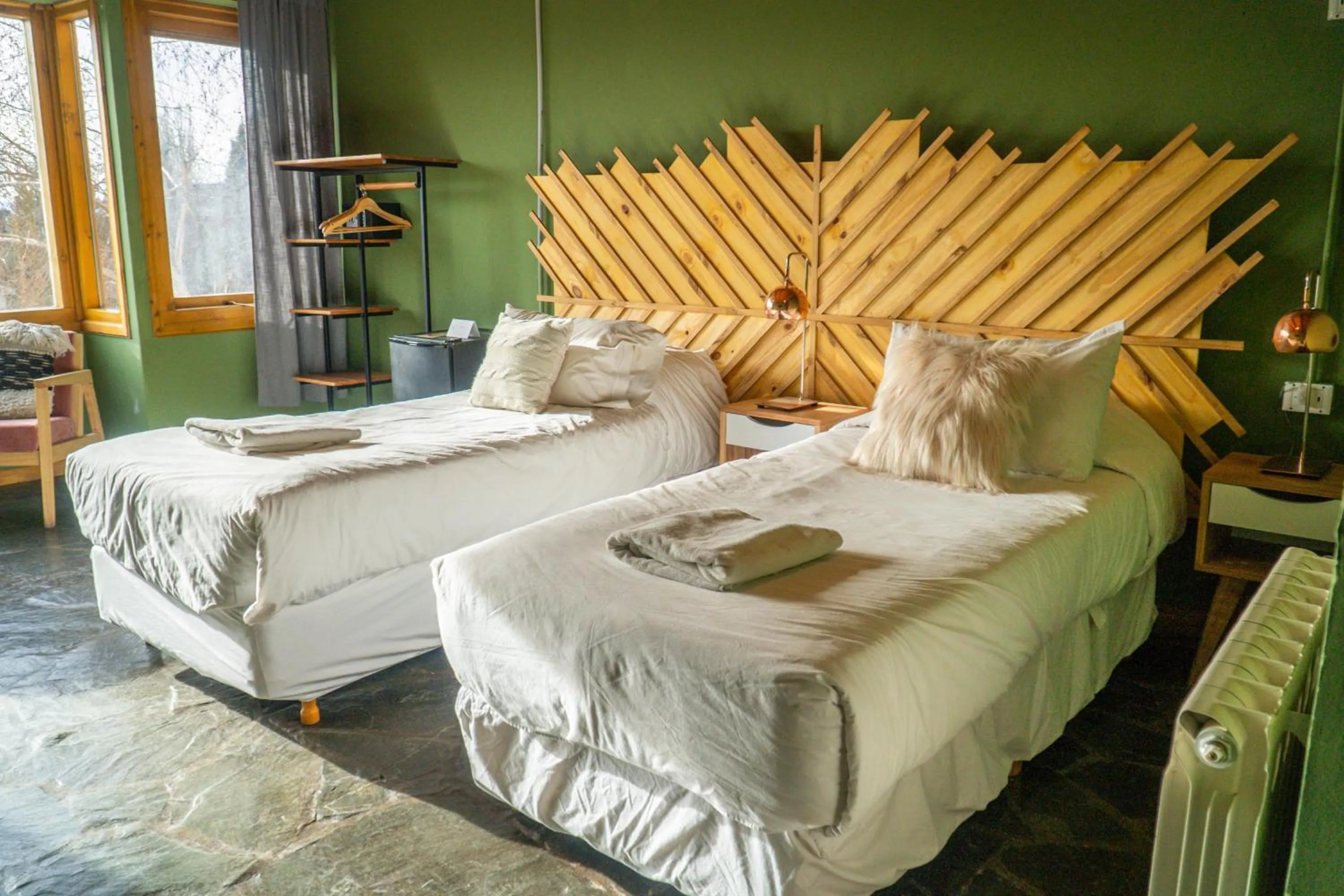 Bedroom, Bed in Pioneros Suites by Grupo Tierra Gaucha