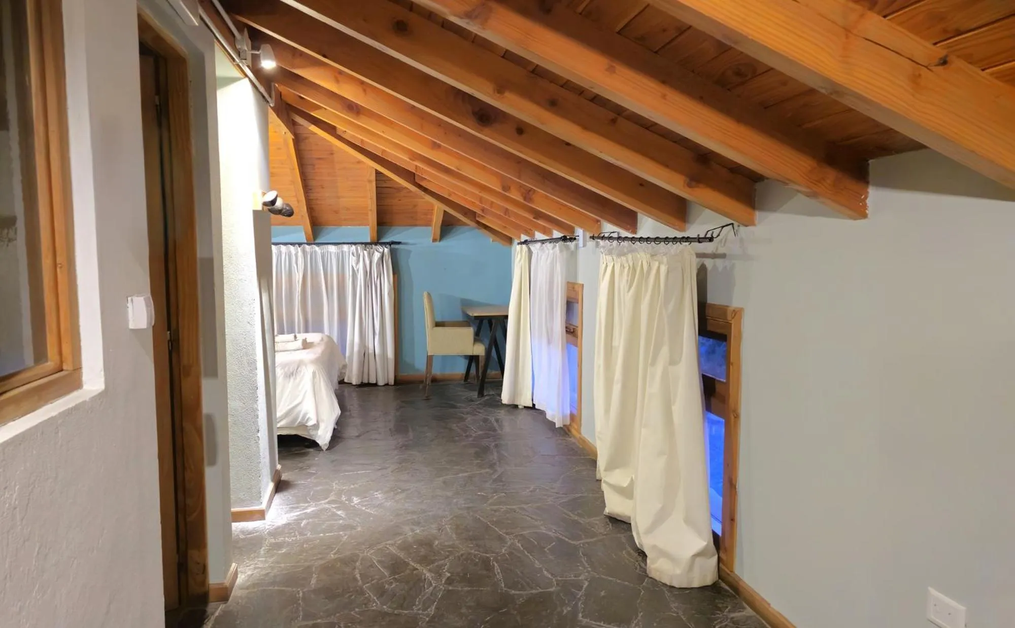 Bedroom, Bed in Pioneros Suites by Grupo Tierra Gaucha