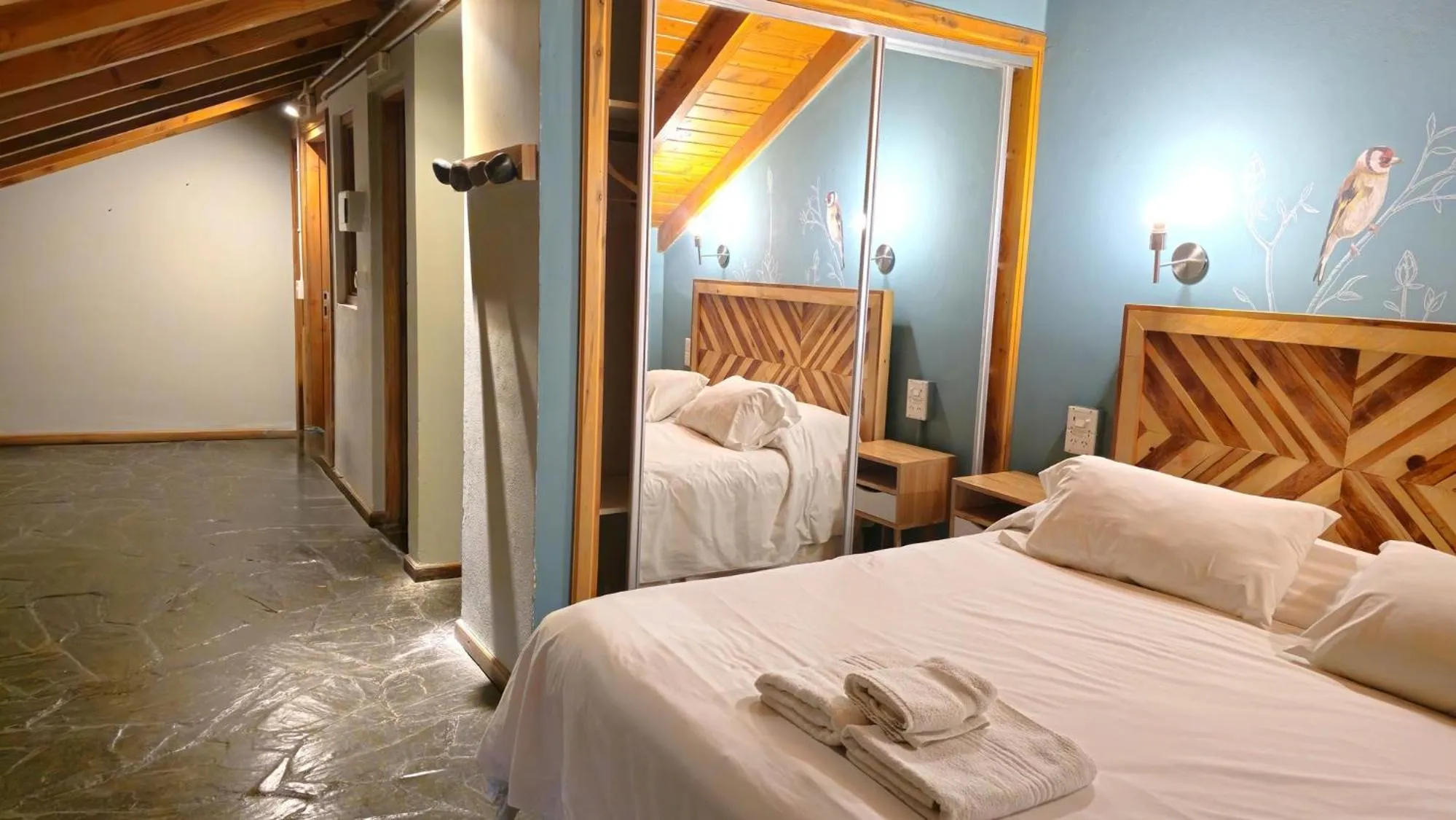 Bedroom, Bed in Pioneros Suites by Grupo Tierra Gaucha