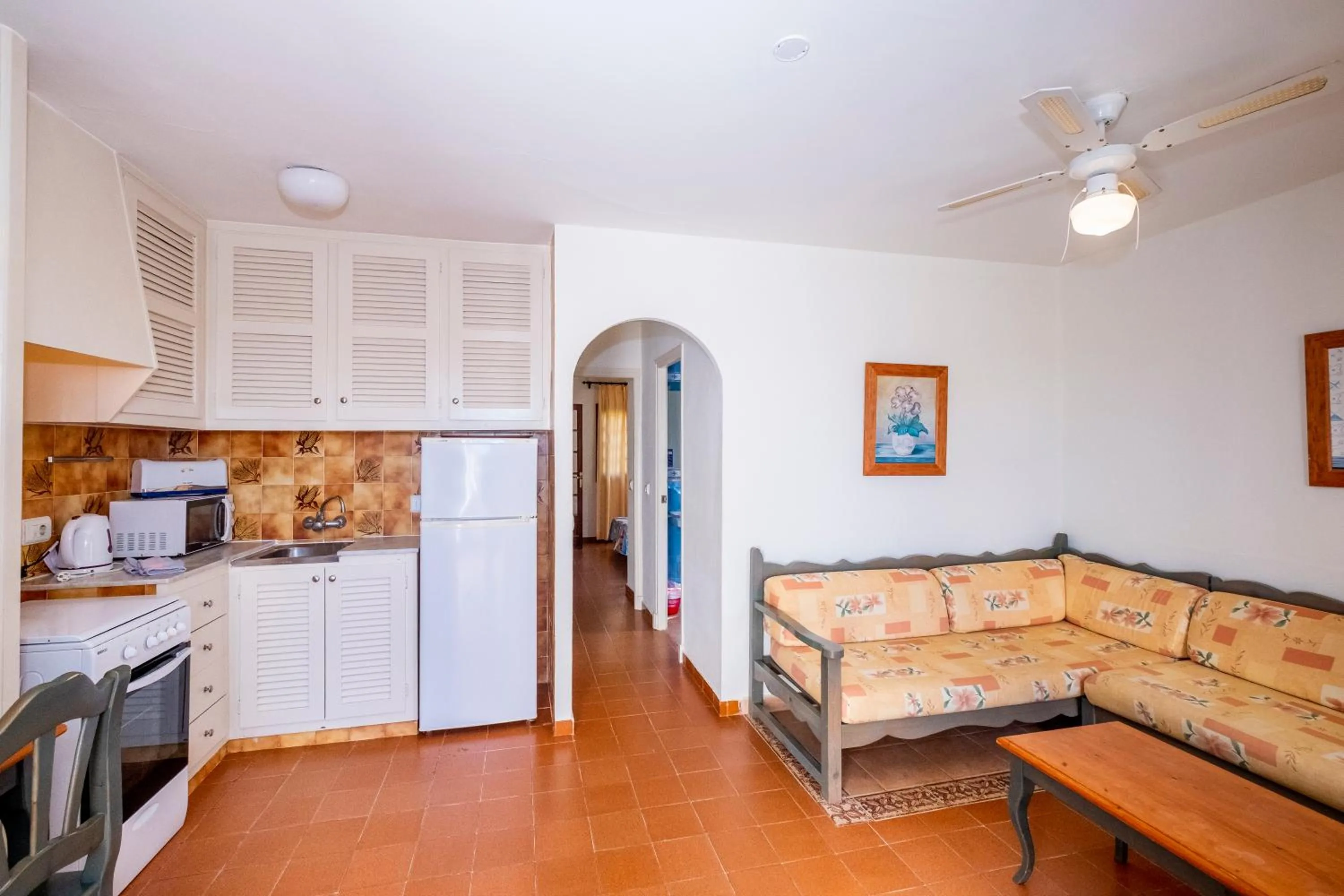 Kitchen or kitchenette in Apartamentos Son Bou Gardens By MENORCARENTALS