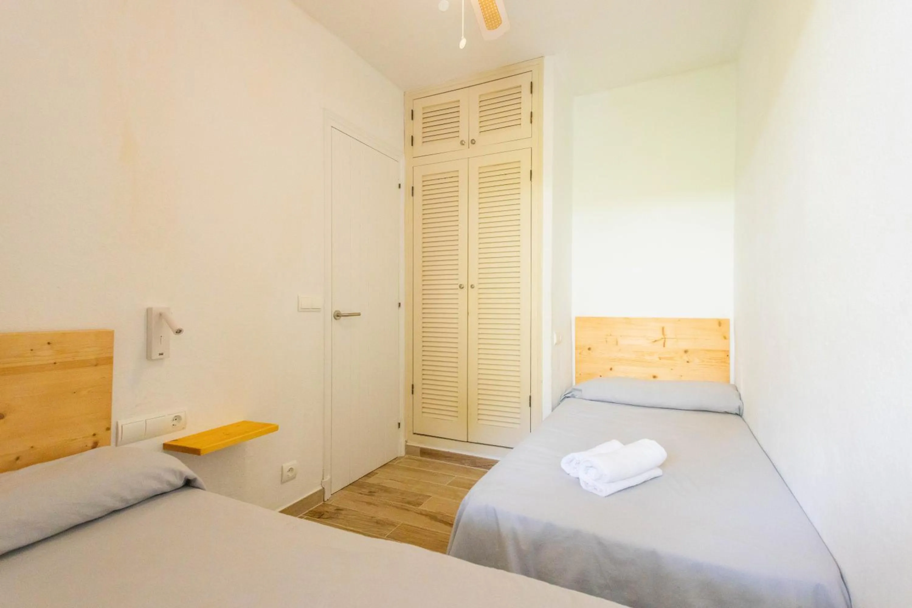Bedroom, Bed in Apartamentos Son Bou Gardens By MENORCARENTALS