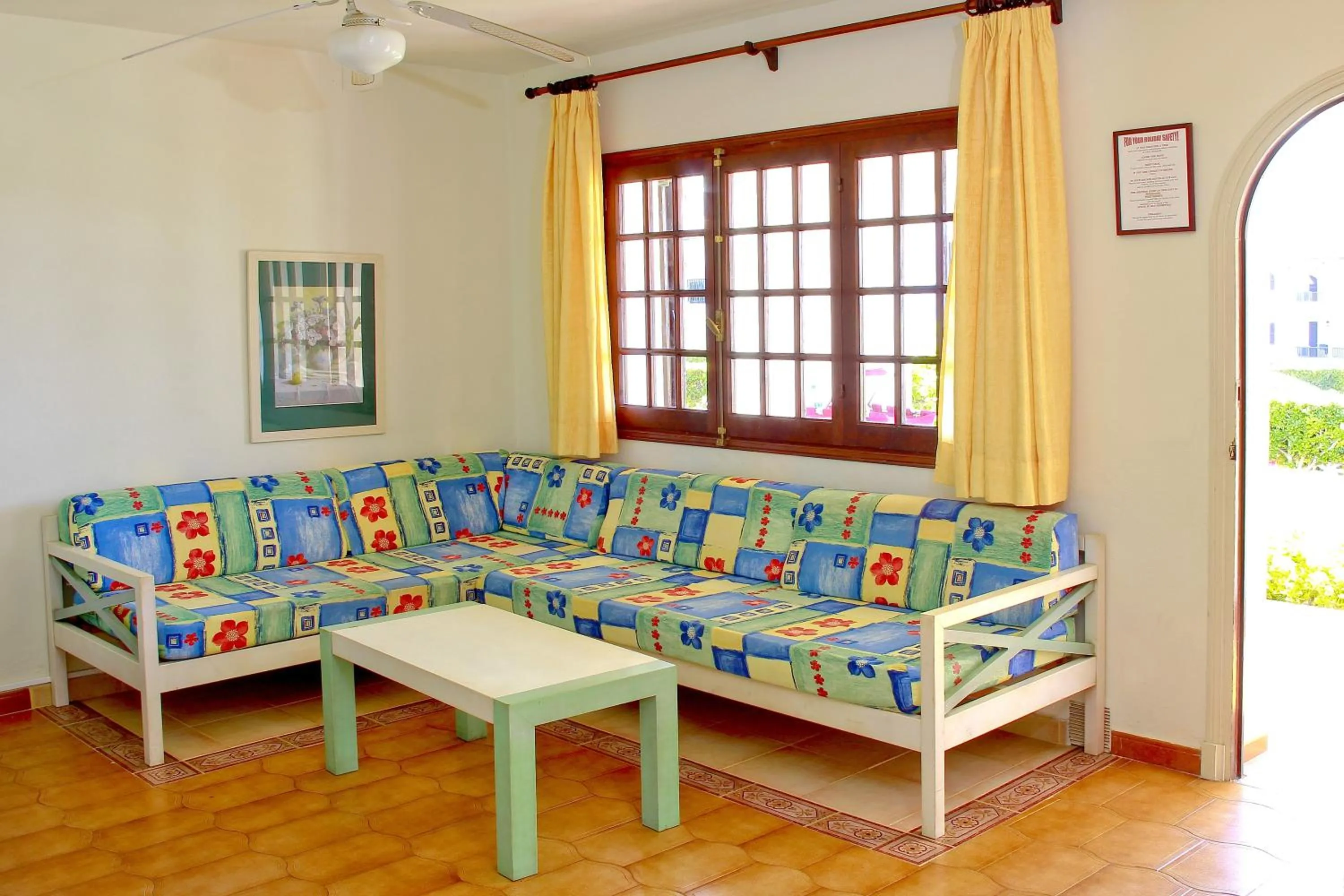 Living room in Apartamentos Son Bou Gardens By MENORCARENTALS