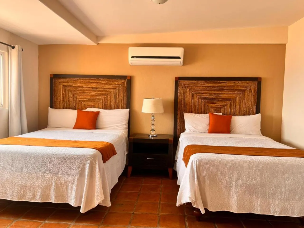 Bed in Los Vientos Hotel