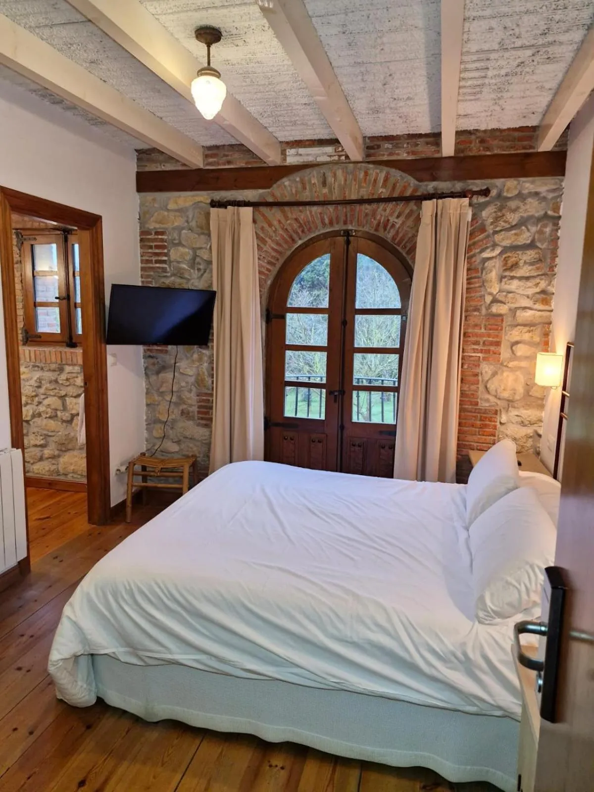 Photo of the whole room, Bed in Hospederia Santillana