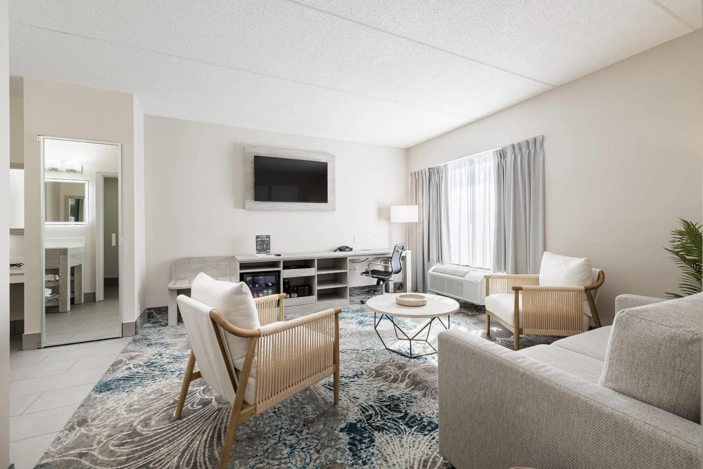 Living room in Oakfield Hotel & Suites, an Ascend Collection Hotel