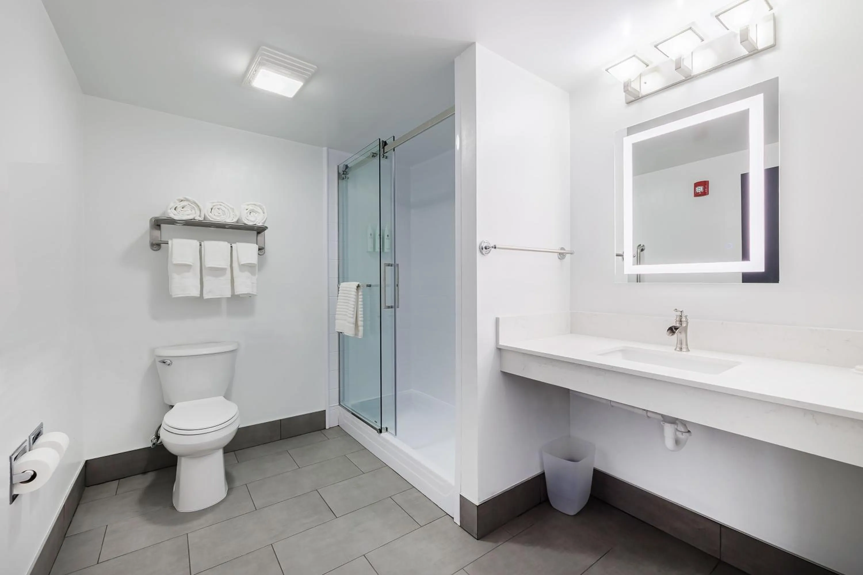 Bathroom in Oakfield Hotel & Suites, an Ascend Collection Hotel