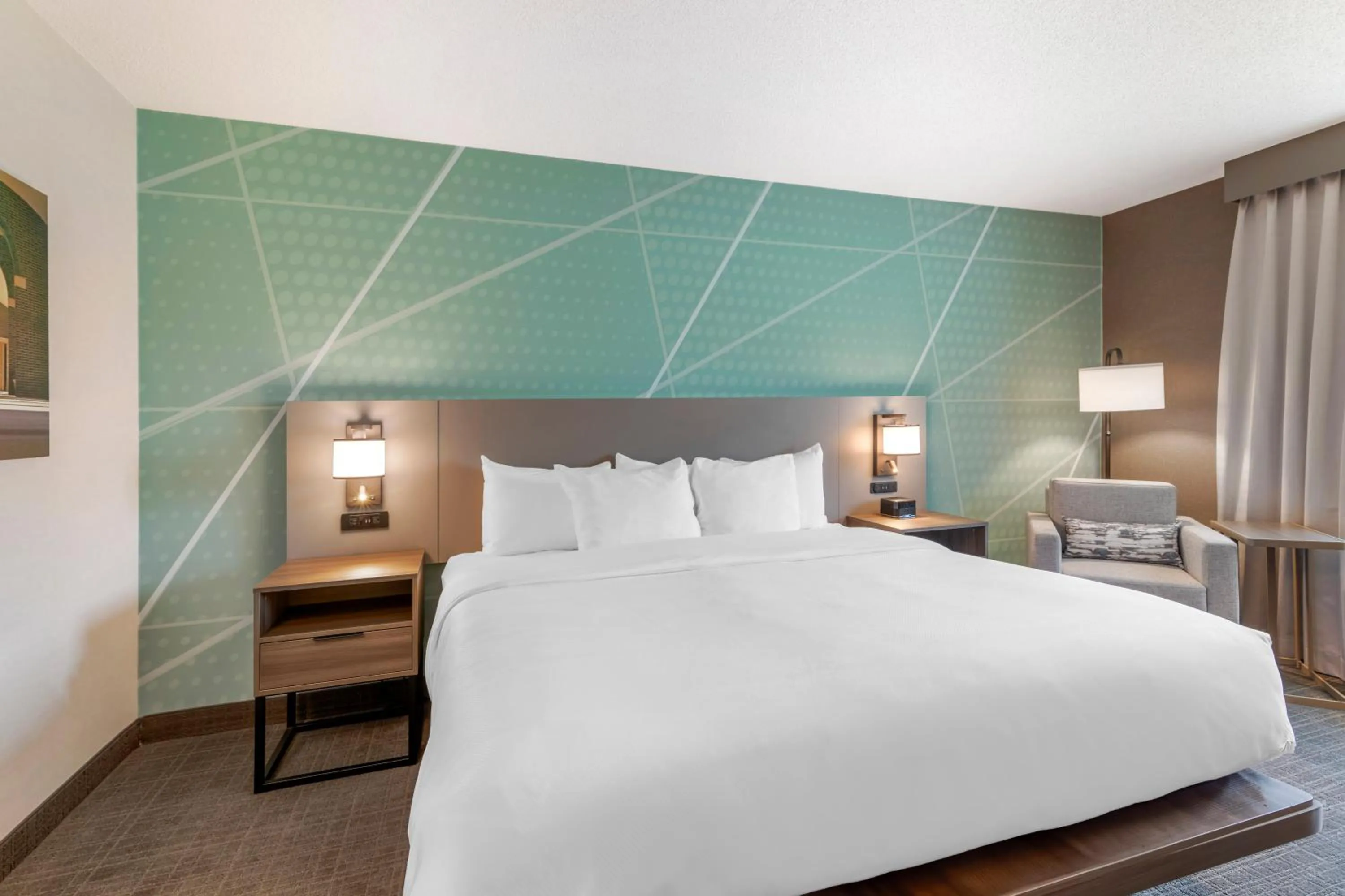 Bed in Comfort Inn & Suites Saratoga Springs