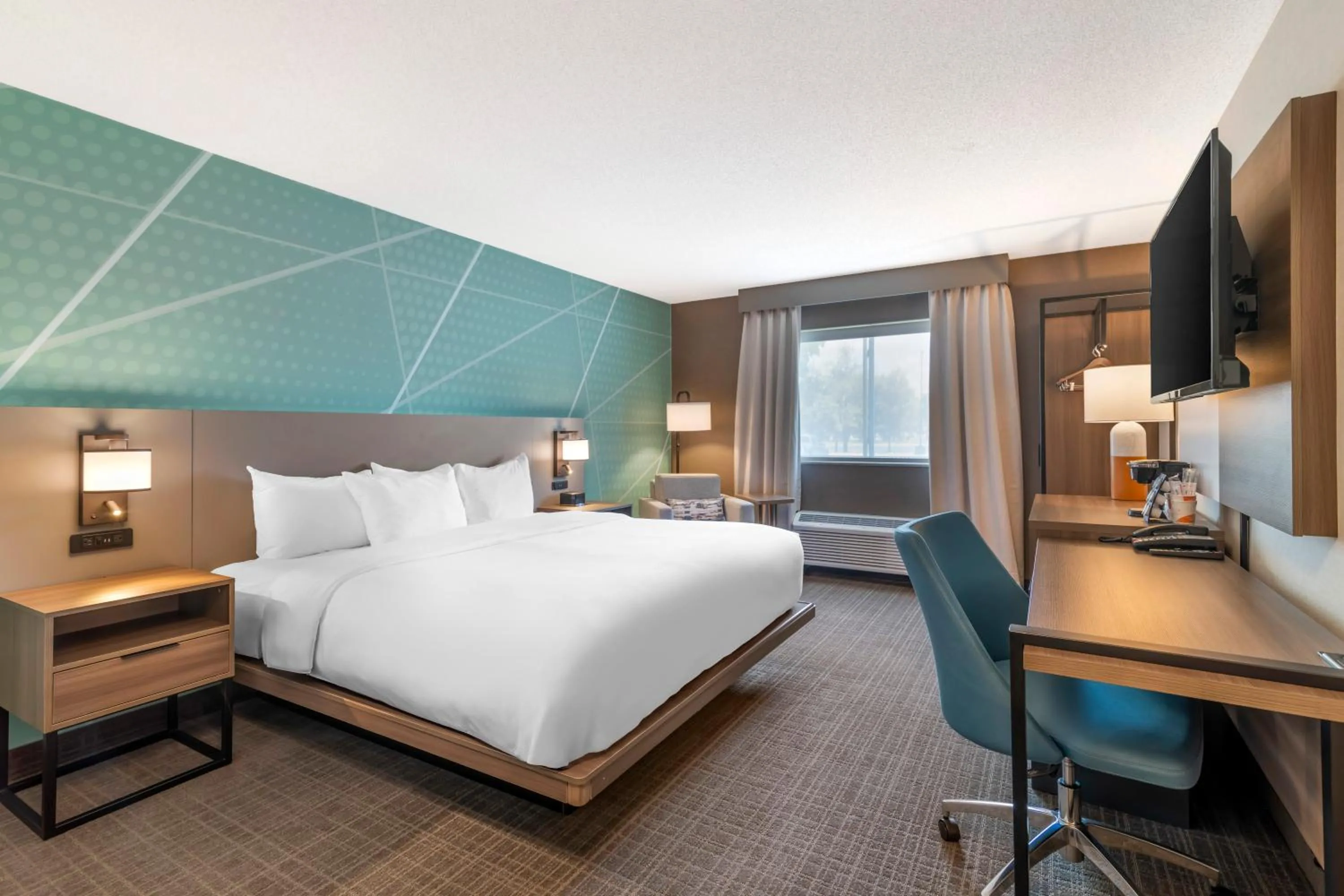 Bed in Comfort Inn & Suites Saratoga Springs