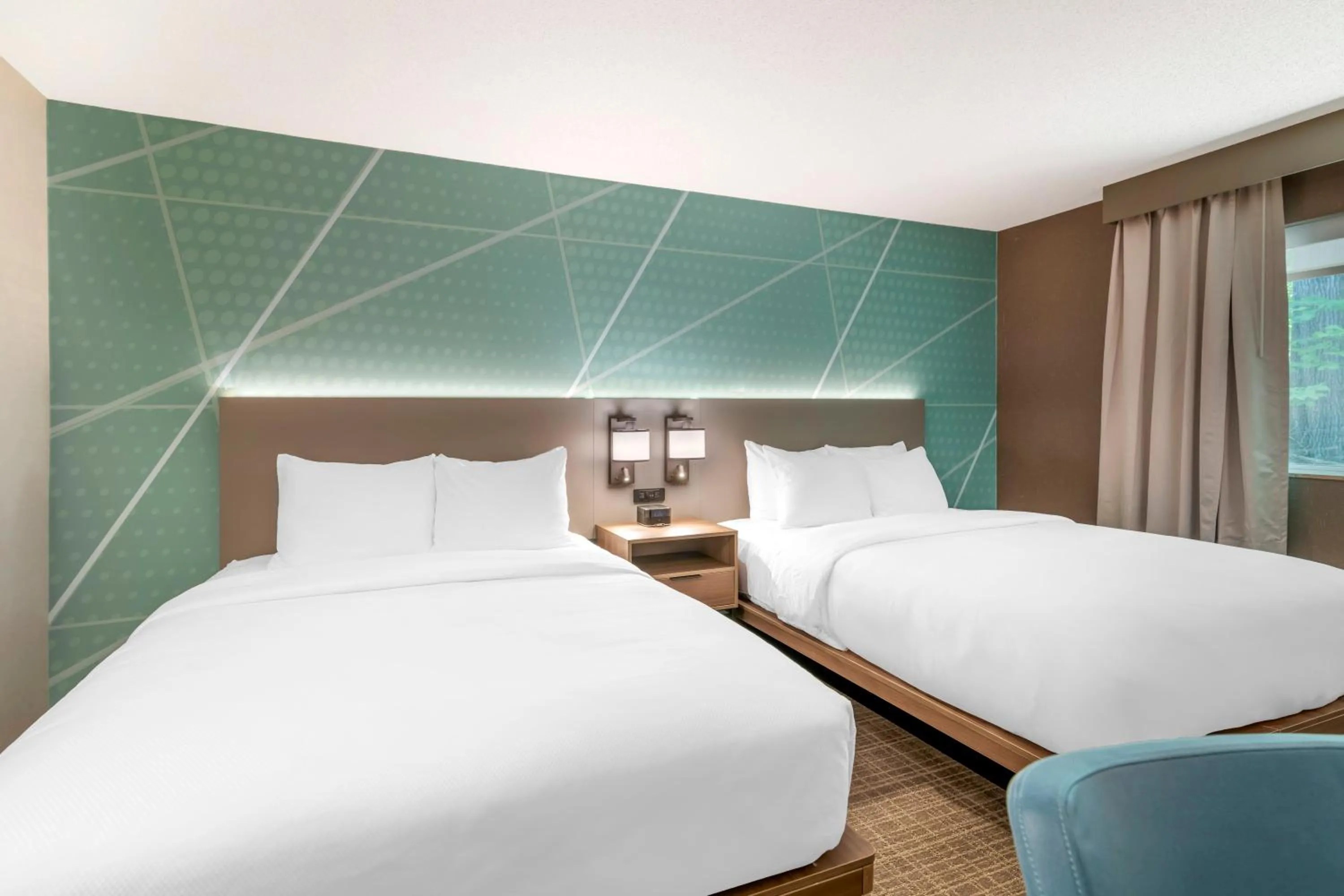 Bed in Comfort Inn & Suites Saratoga Springs