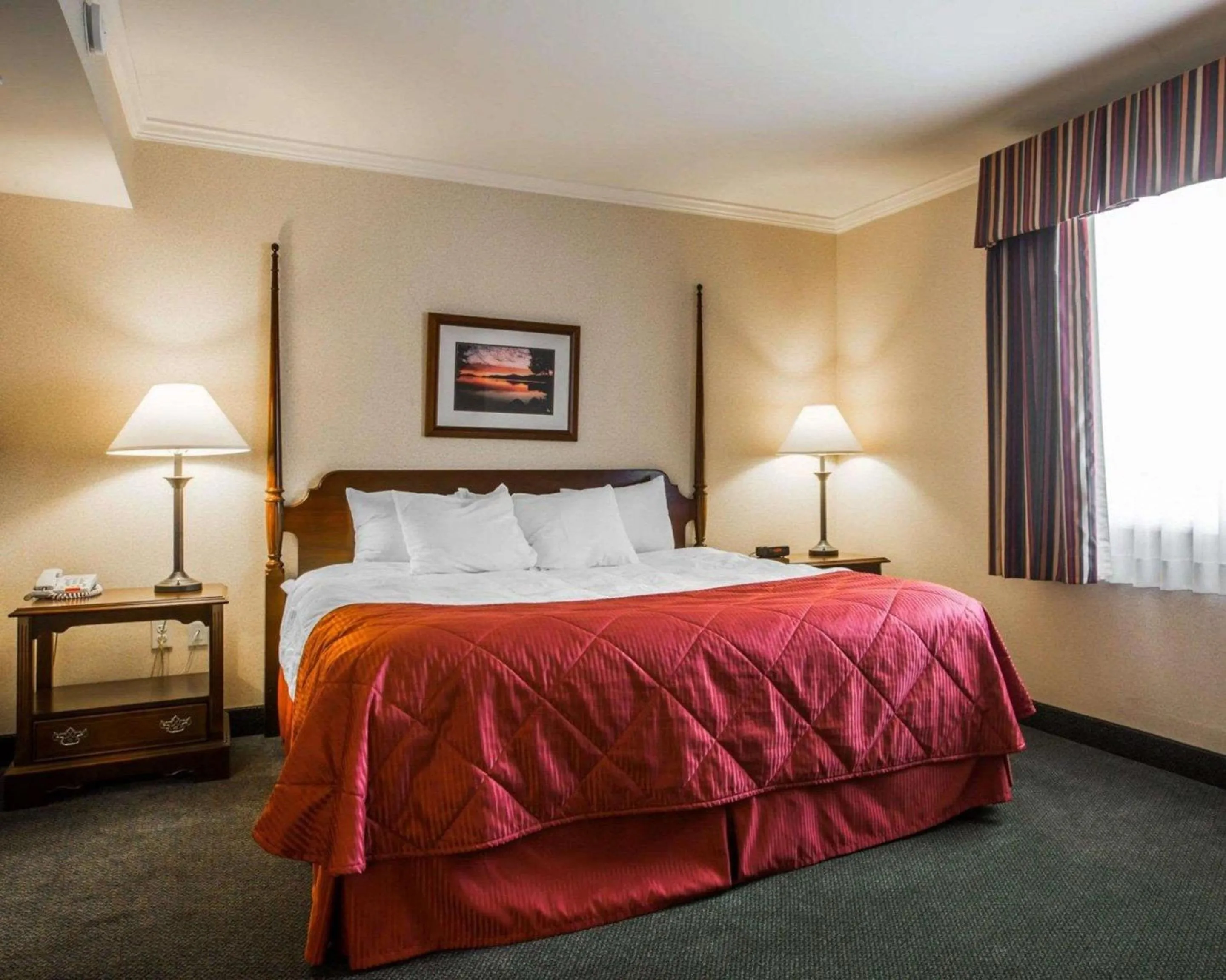 Bedroom, Bed in Clarion Inn & Suites at the Outlets of Lake George