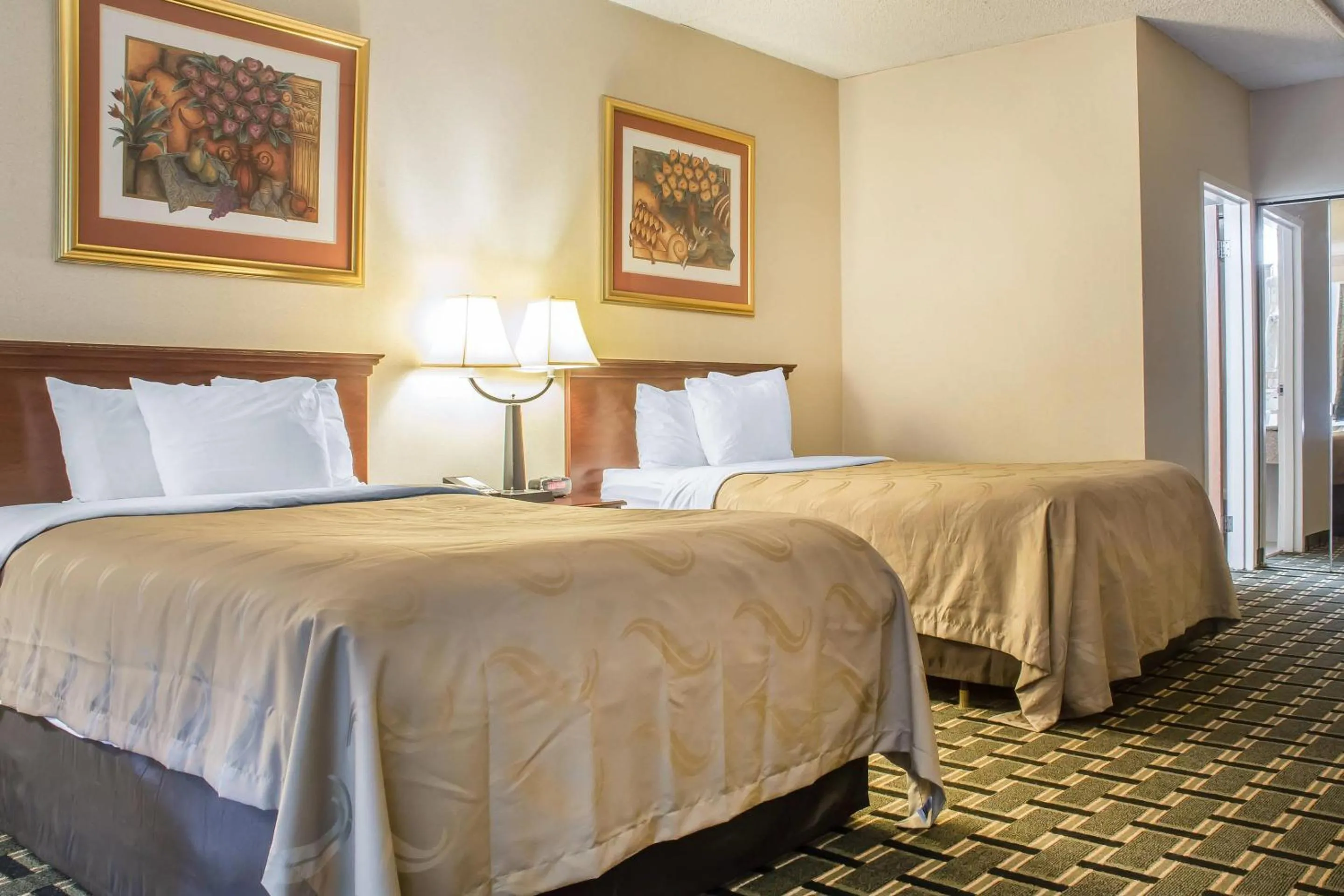 Bedroom, Bed in Quality Inn & Suites Palm Island Indoor Waterpark