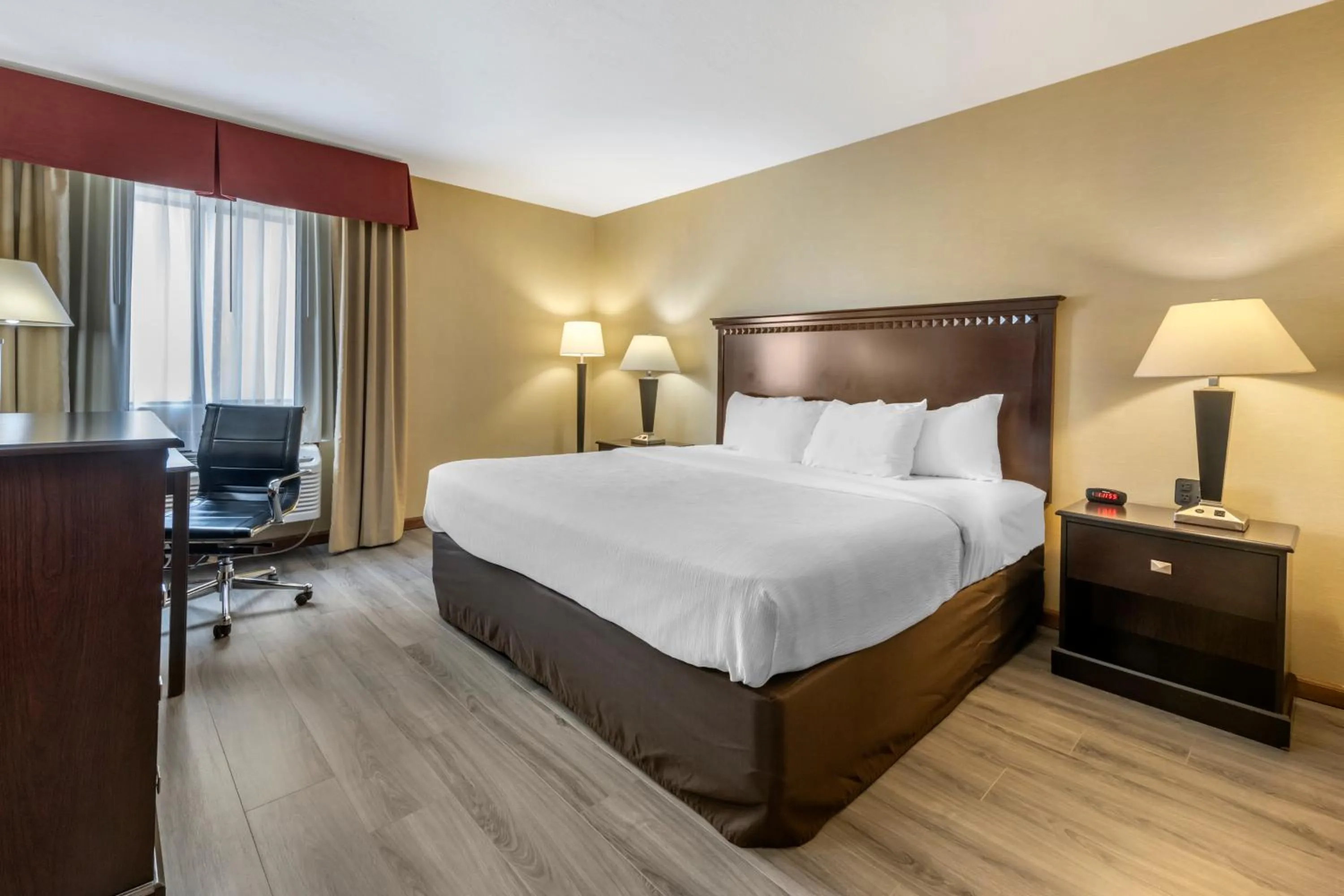 Bed in Quality Inn Greenville North