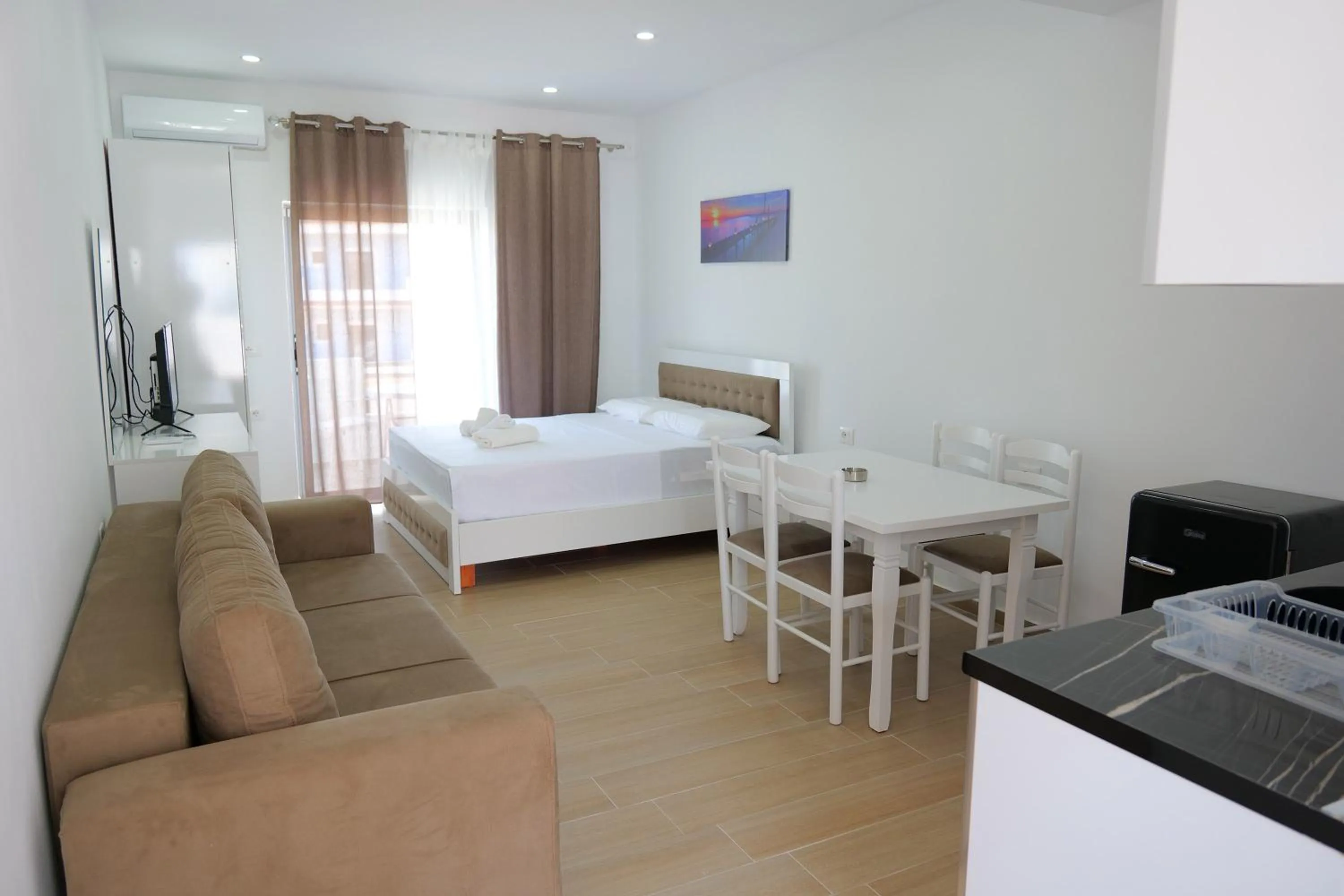 Living room, Bed in Lux Apartments