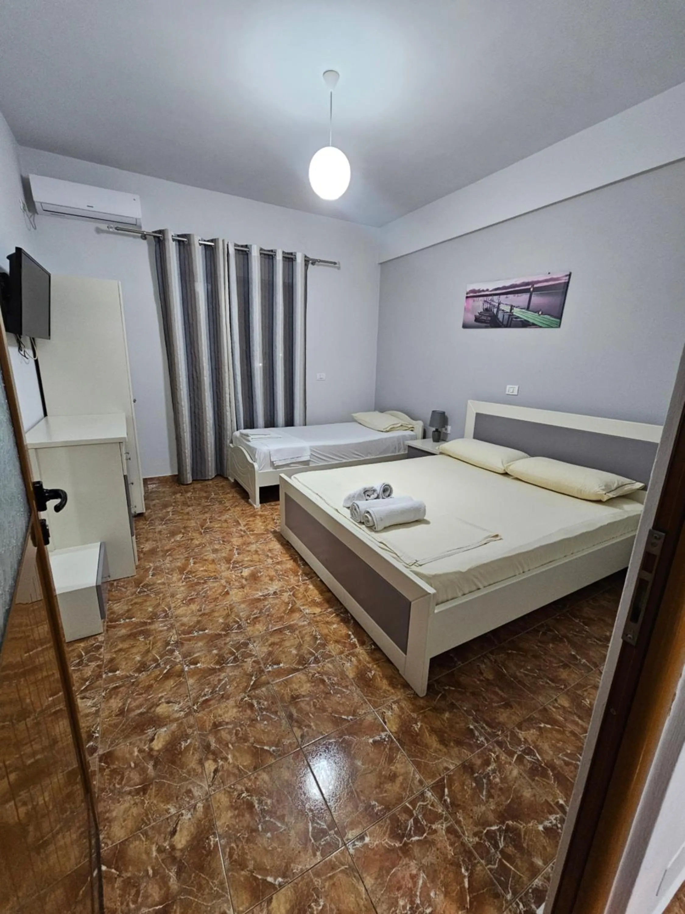 Bed in Lux Apartments