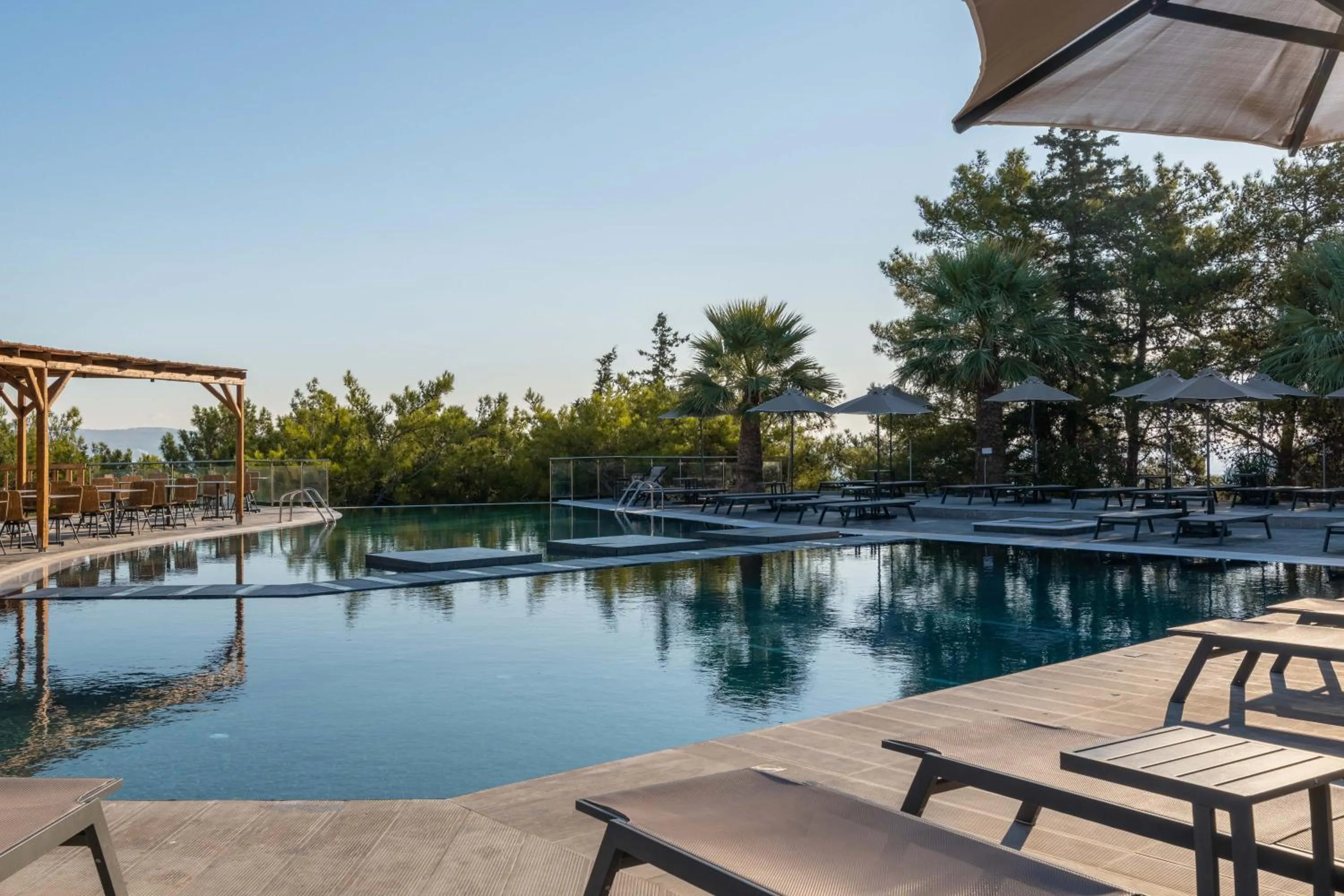 Swimming pool in Atalanti Boutique Hotel - Adults Only