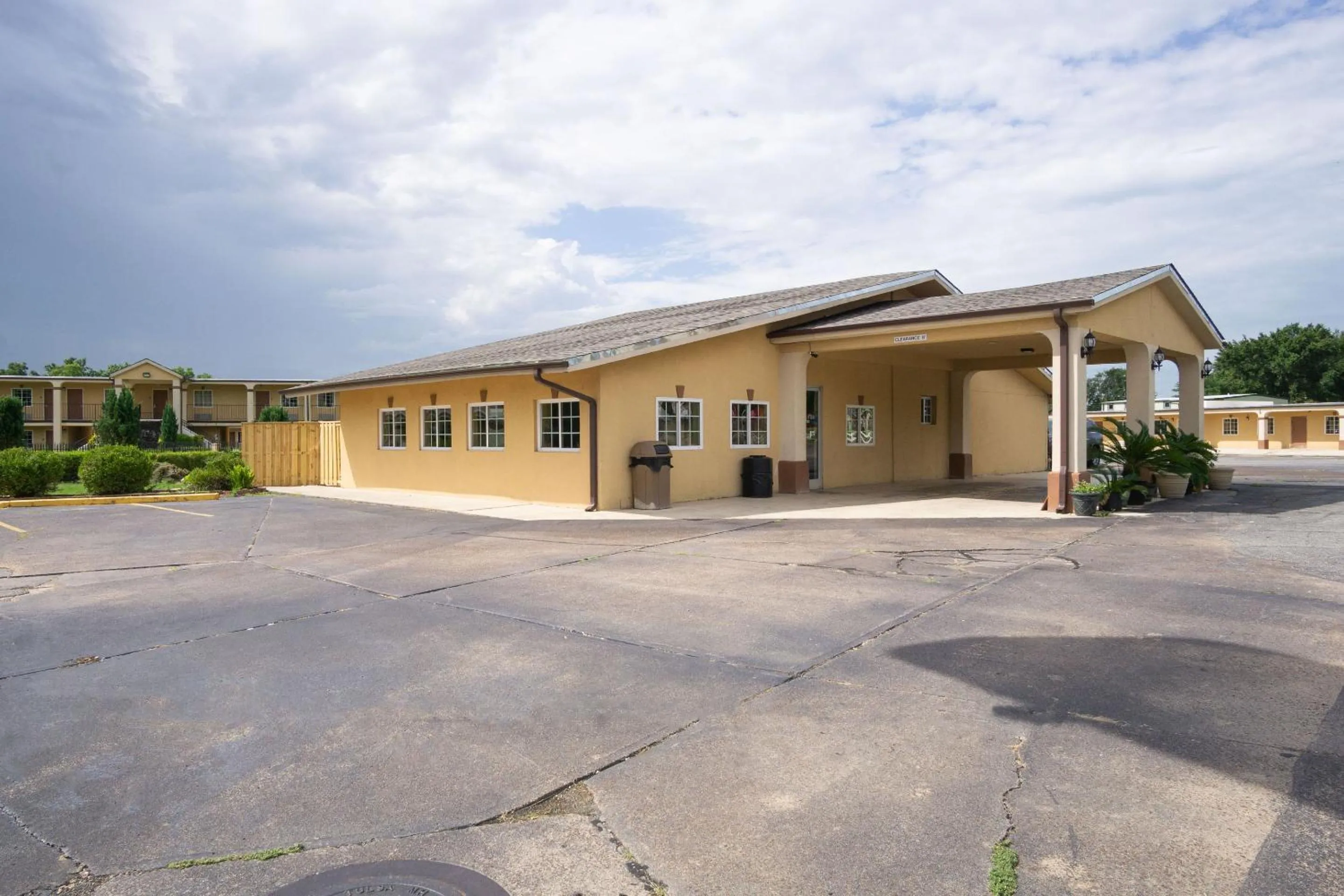 Property building in Woodridge Inn and Suites